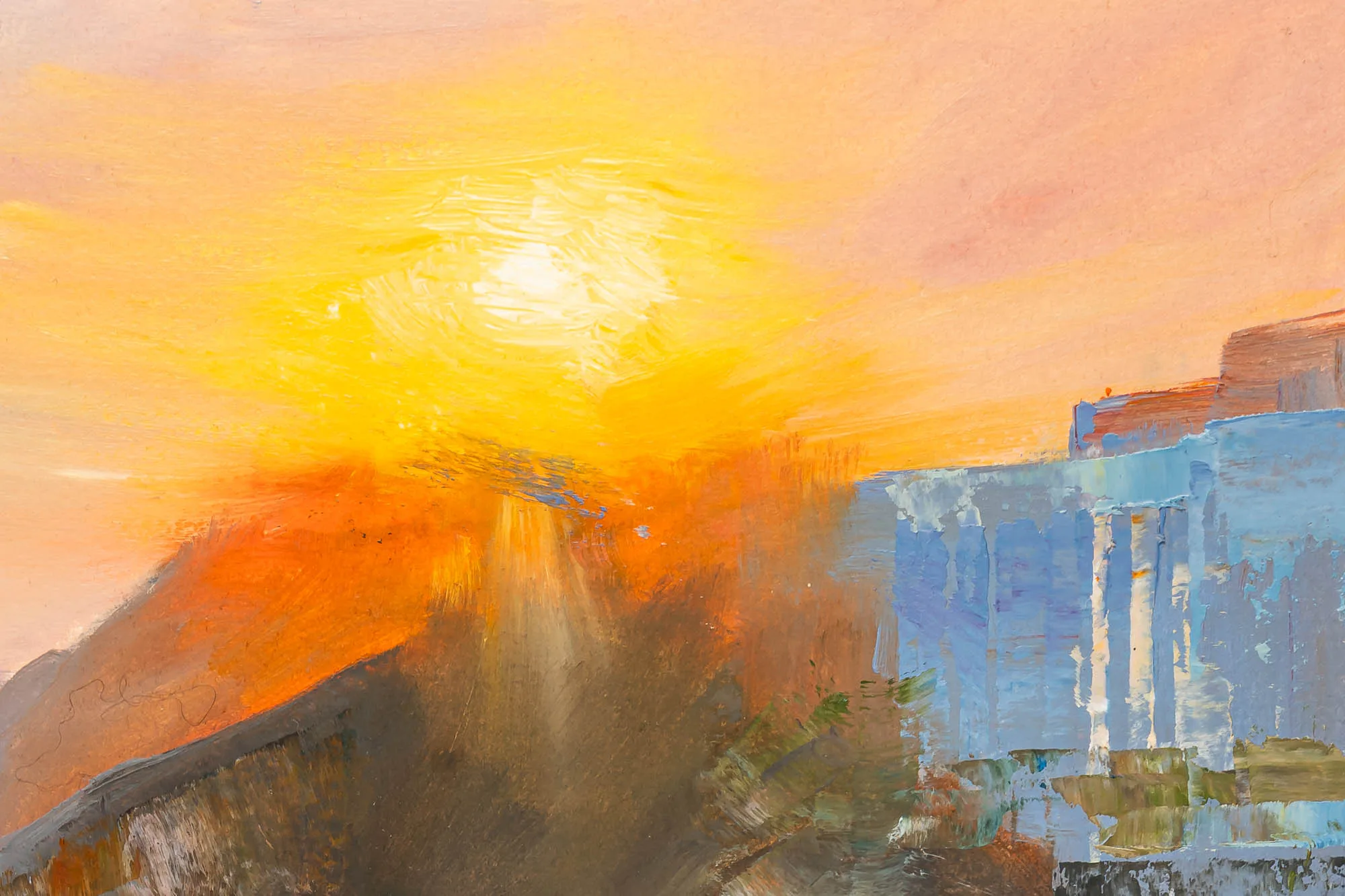 Close-up of Last Light in Biarritz, an original oil painting by Paul Kenton: a glowing yellow sun blazes over orange hills, with thick blue-white buildings on the right.