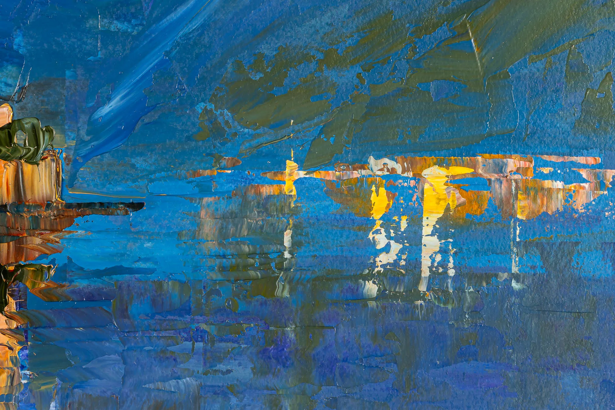 Close-up of Sapphire Reflections, an original painting by Paul Kenton, showing thick blue brushstrokes and glowing yellow and orange lights reflected on rippling water.