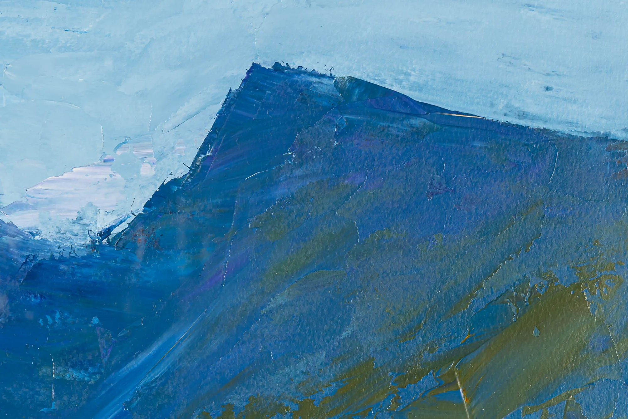 Close-up of Sapphire Reflections, an original oil on paper painting by Paul Kenton, showing thick blue brushstrokes forming a sharp dark ridge against pale icy sky, with olive and violet undertones.