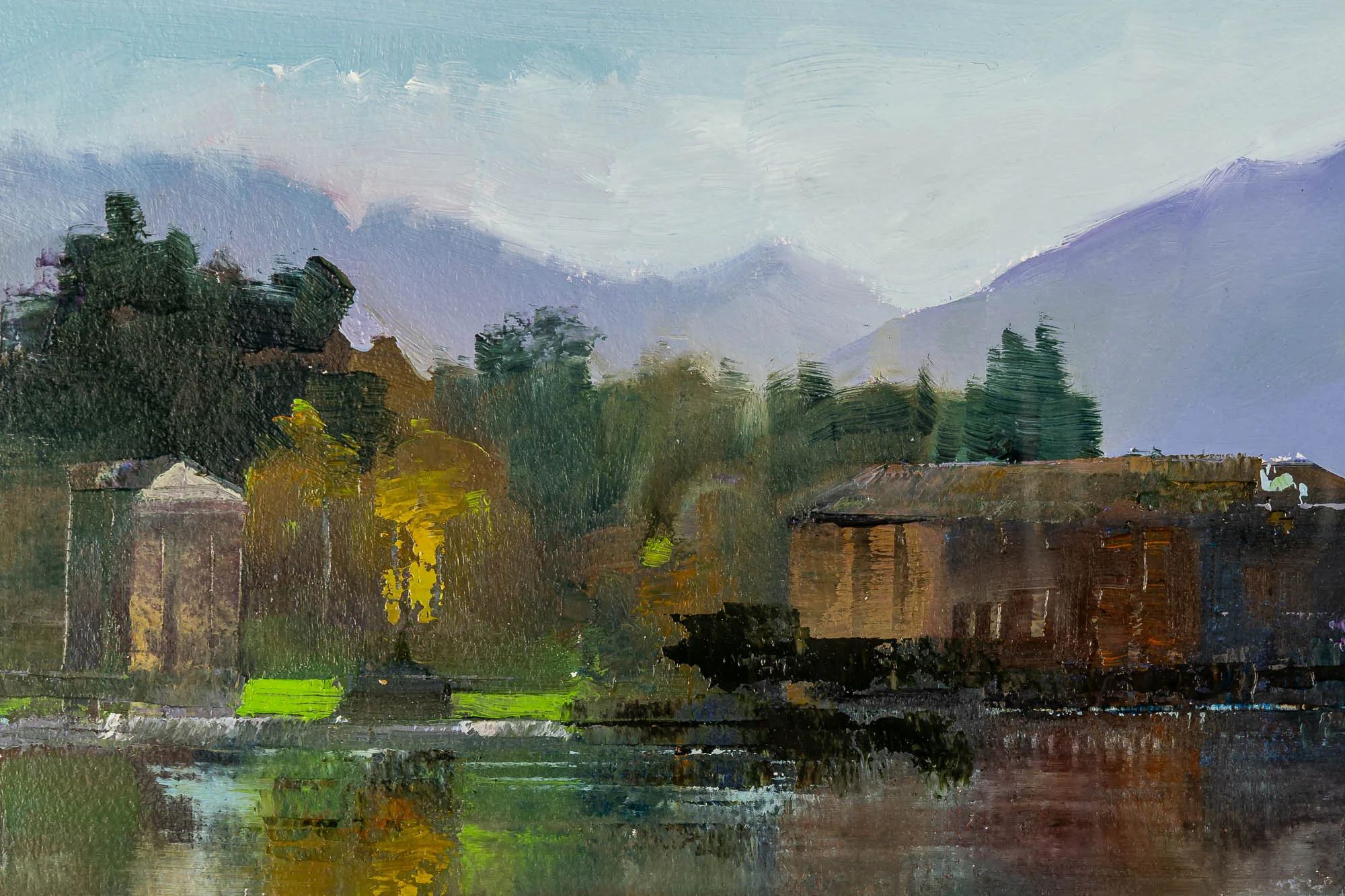 Close-up of Calm Waters Of Como, an original gouache painting by Paul Kenton: loose, textured brushwork showing lakeside buildings, dark trees and lilac mountains reflected in still water.