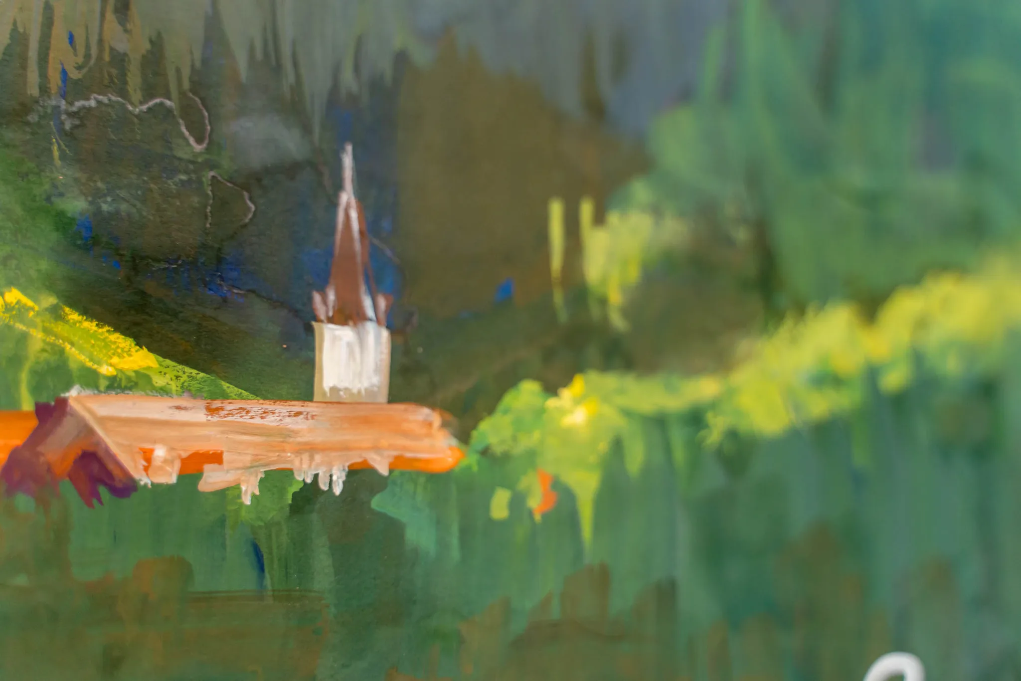 Close-up of Alpine Sanctuary, an original painting by Paul Kenton: loose green and yellow brushstrokes, a small white church spire with a brown roof, and drips of orange paint.