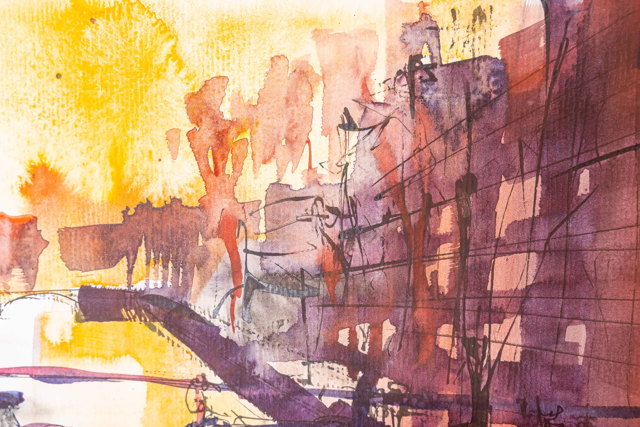 Close-up of Amsterdam Ambiance, an original watercolour and ink painting by Paul Kenton, showing loose golden washes above a canal bridge and purple-brown building façades with sketched lines.