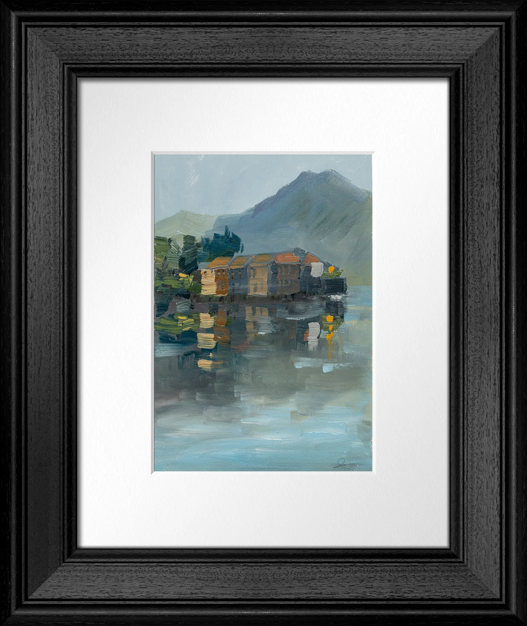 Lakeside Tranquility, an original oil painting by Paul Kenton, in a black wooden frame with a white mat: soft blue-grey lake, reflected terracotta-roofed houses and a misty mountain.