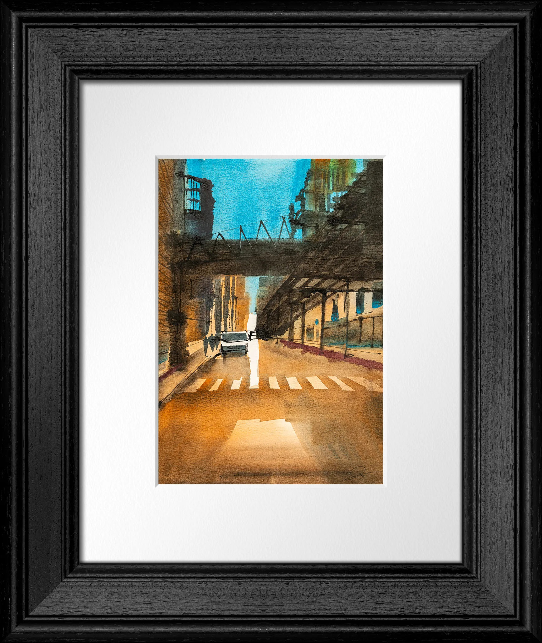 Urban Lines, an original watercolour and ink painting by Paul Kenton, shown in a black wooden frame with a white mount. A Chicago street of warm ochre and teal, with a lone figure crossing a zebra crossing.