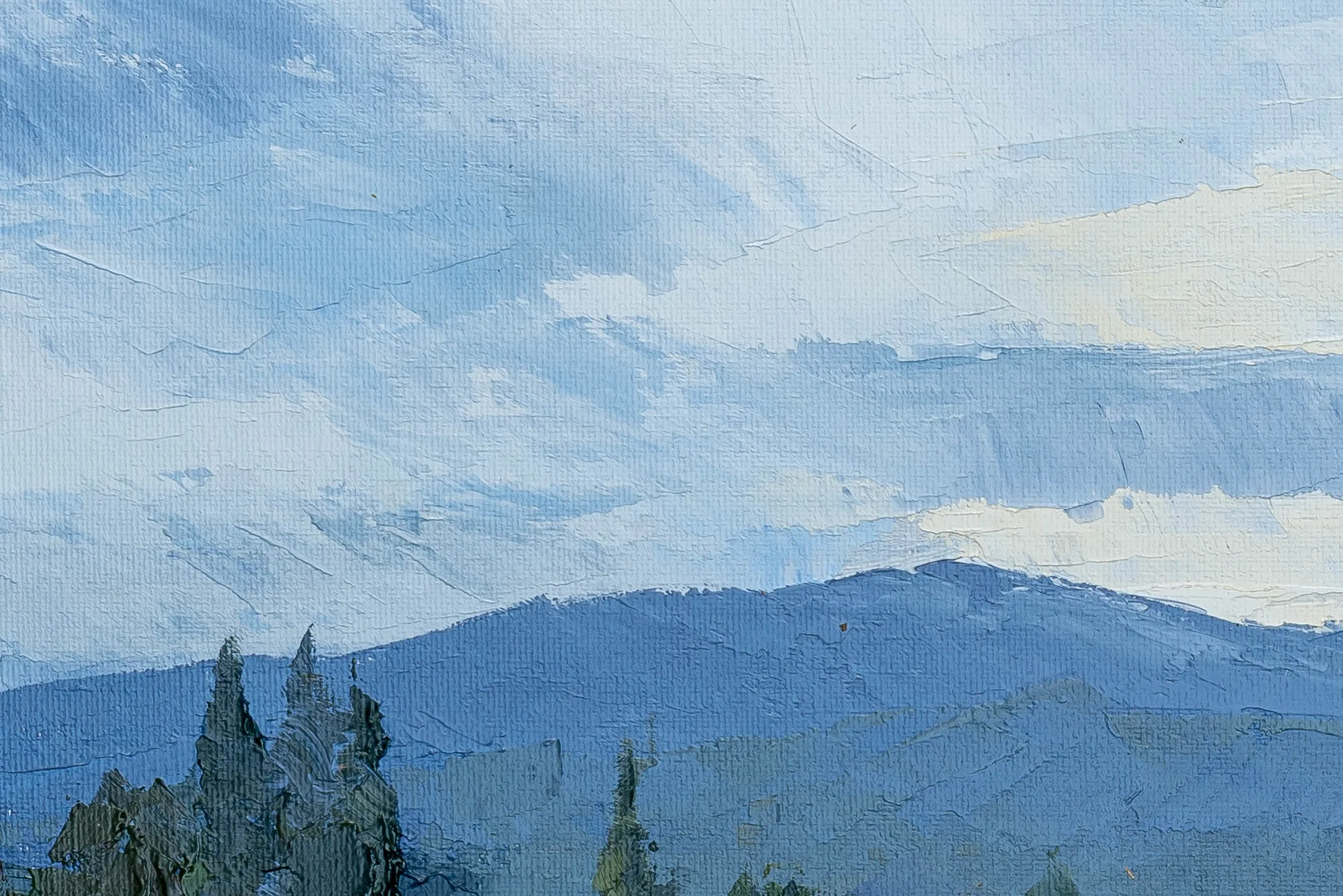 Close-up of Distant Mountains, an original oil painting by Paul Kenton, showing thick blue brushstrokes of layered mountains beneath a pale, textured sky, with dark evergreen trees in the foreground.