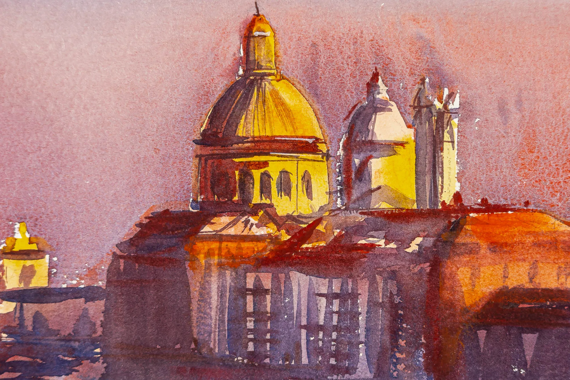 Close-up of Sunset Hues Over Venice, an original watercolour by Paul Kenton: a golden domed church and bell tower glow against warm rust and violet washes, with dark arched buildings below.