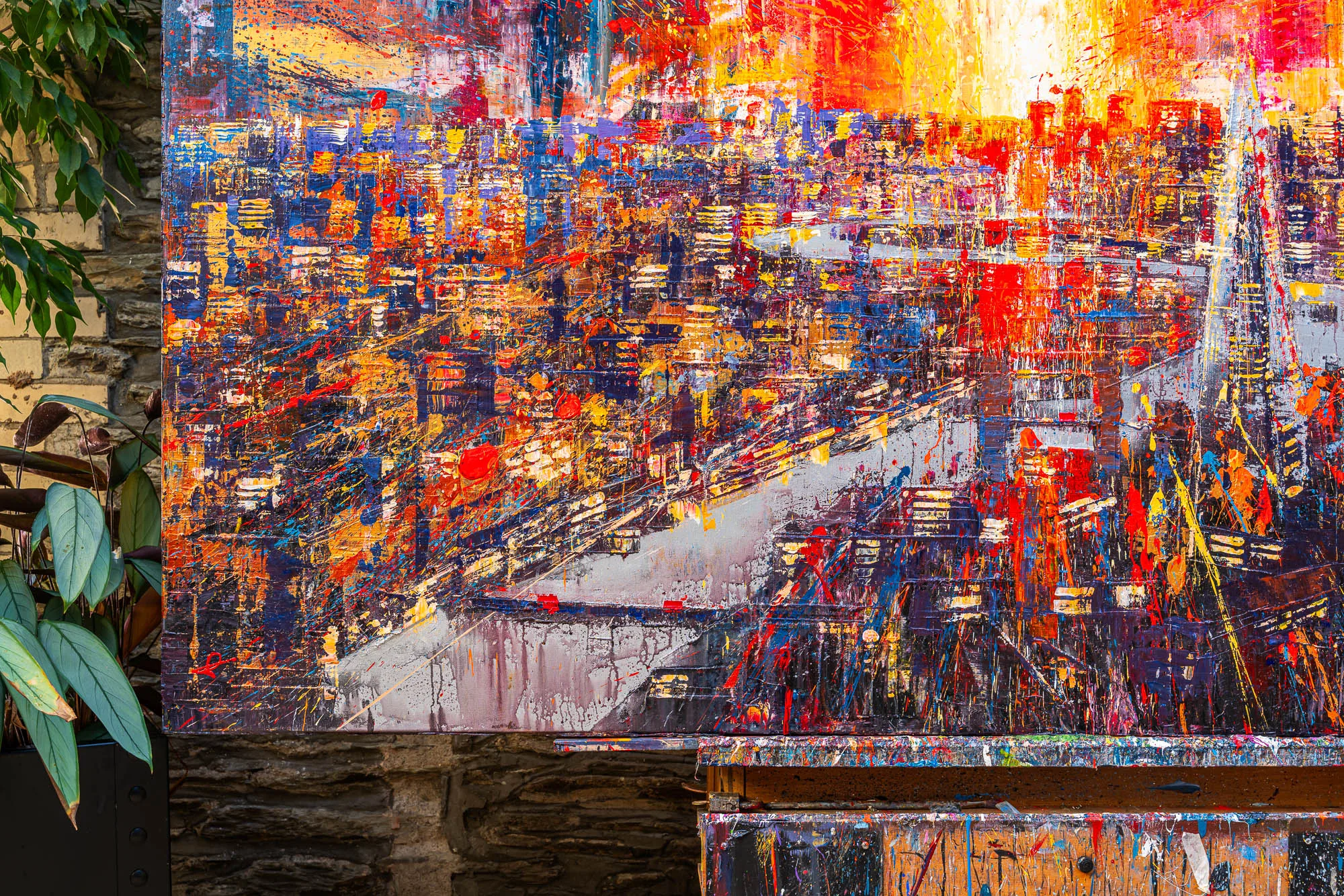 Close-up of Blaze Across the Thames, an original painting by Paul Kenton: thick, textured strokes of orange, red and gold over a dense, glittering London cityscape at dusk.