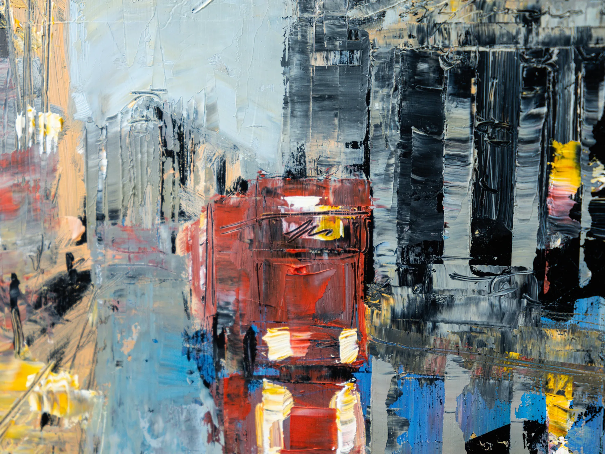 Close-up of Bank Junction, an original painting by Paul Kenton, showing thick palette-knife texture: a red London bus with glowing white headlights against grey and black buildings, touched with yellow and blue.