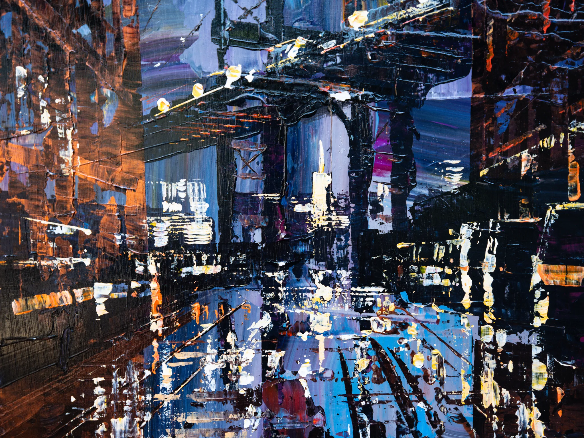 Detail of Bridge Nocturne, an original painting by Paul Kenton: thick, textured strokes of blue, violet and amber suggest city lights reflected on wet streets beneath a night-time bridge.
