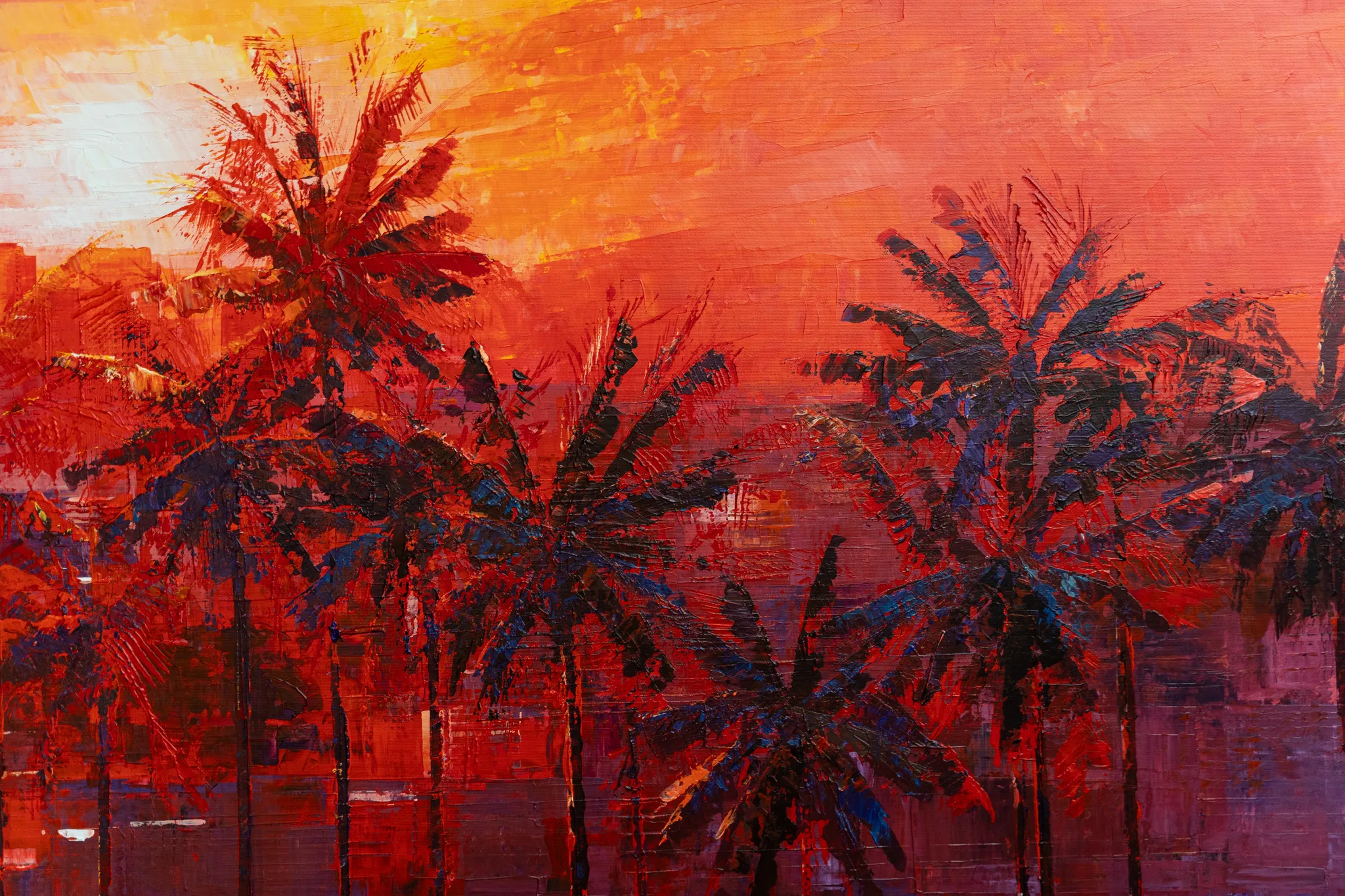 Close-up of City Beyond the Palms, an original painting by Paul Kenton: thick, textured dark palm silhouettes against a blazing orange and red sunset, with faint city towers beyond.