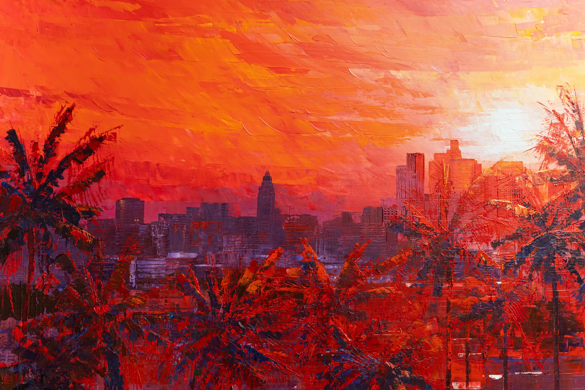 Close-up of City Beyond the Palms, an original painting by Paul Kenton: thick, textured brushstrokes show palm fronds silhouetted against a fiery orange sunset over a dark city skyline.