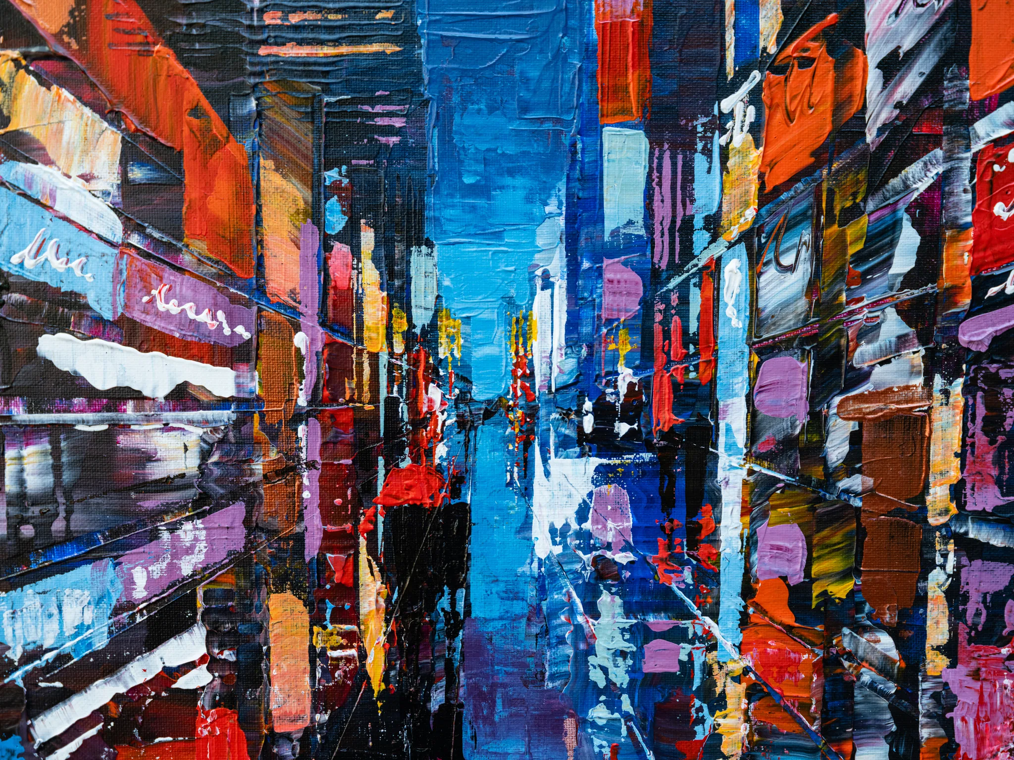 Close-up of City Corridor, an original painting by Paul Kenton, showing thick palette-knife strokes of red, orange and blue forming a narrow street of city buildings and shopfronts.