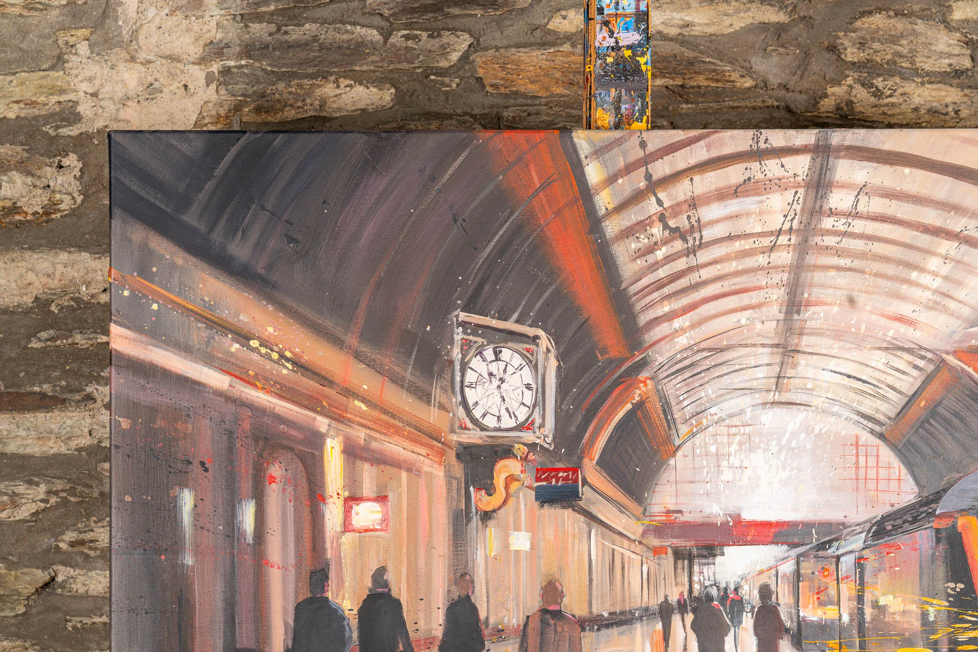 Detail of Capital Connections, an original oil painting by Paul Kenton showing a curved, glass-roofed London station platform with a clock, commuters and warm orange and grey brushwork.