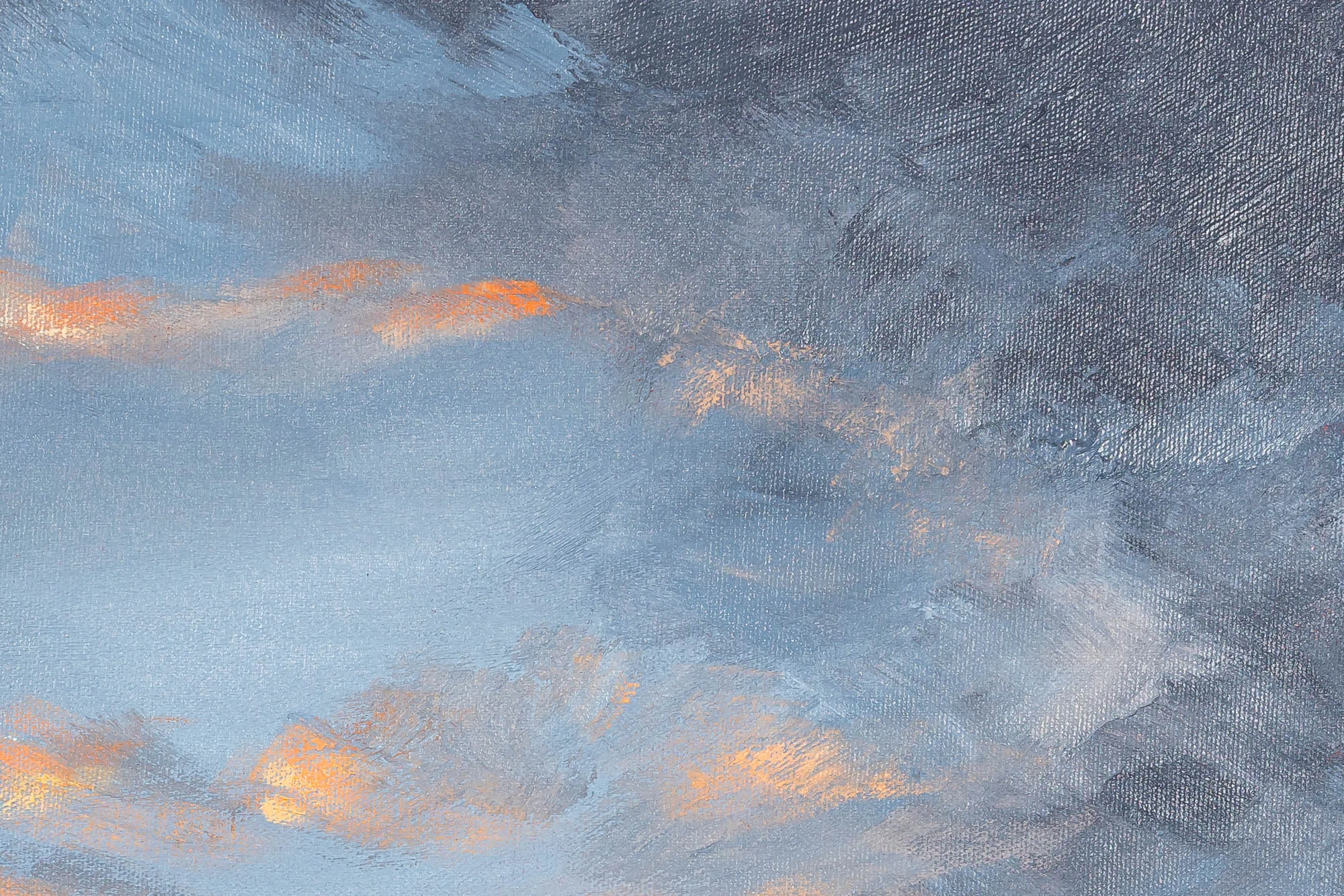Close-up of Coastal Embers, an original oil painting by Paul Kenton, showing textured brushstrokes of pale blue and slate grey sky with glowing orange streaks of evening light.