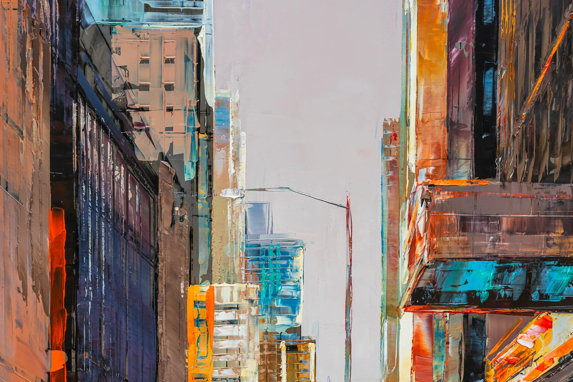 Close-up of City in Silver Light, an original oil painting by Paul Kenton: thick palette-knife strokes of orange, blue and teal build tall New York building facades around a pale grey sky.