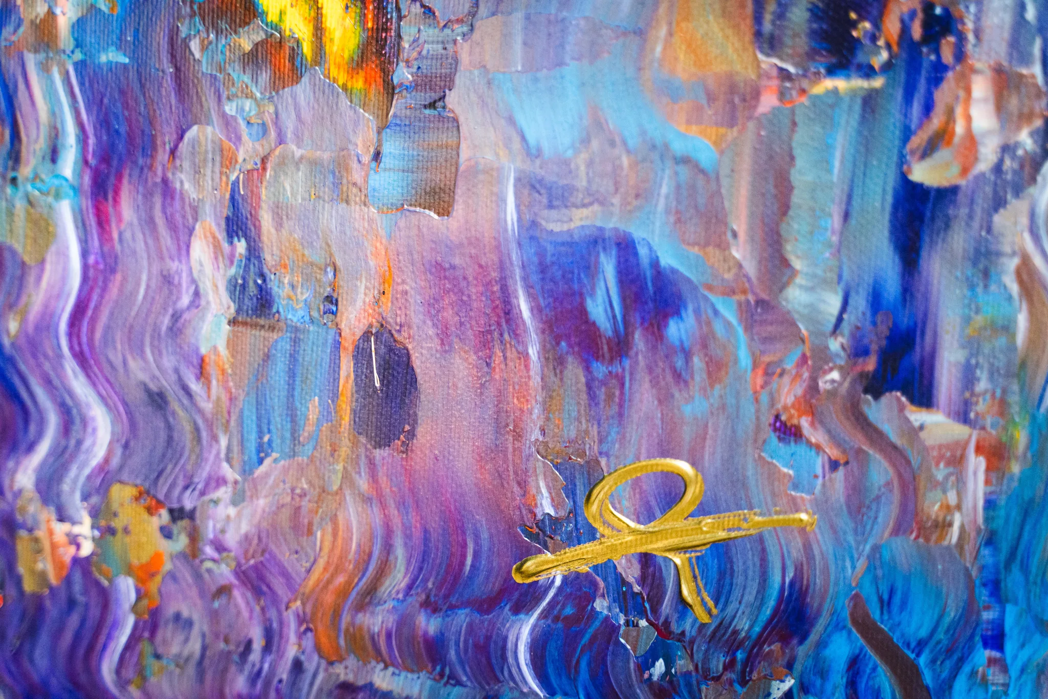 Close-up of Currents of Light, an original painting by Paul Kenton, showing thick, textured strokes of violet, blue and amber paint with a gold metallic mark.