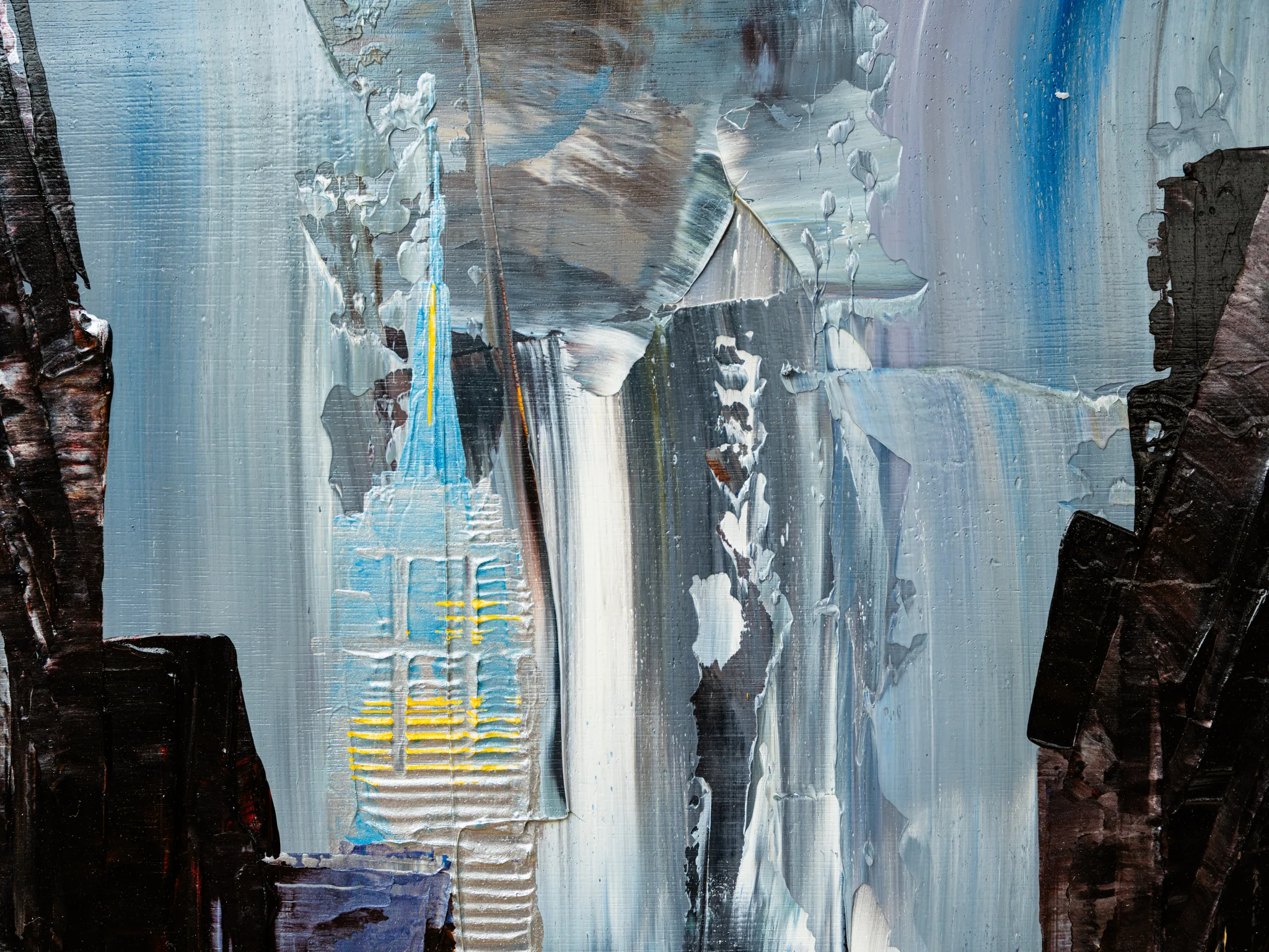 Close-up of Dark Midtown, an original painting by Paul Kenton: thick, scraped layers of grey, white and pale blue paint, with a lit blue and yellow tower rising through dark brown edges.