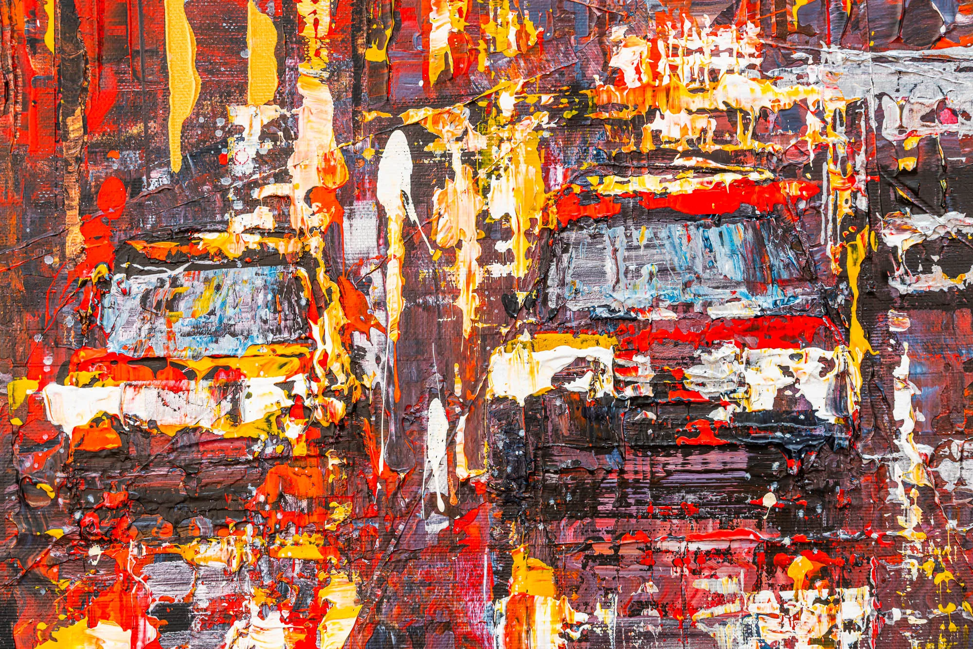 Close-up of Embers of the City, an original painting by Paul Kenton: thick, textured red, yellow and white paint suggests blurred city traffic and lights at night.