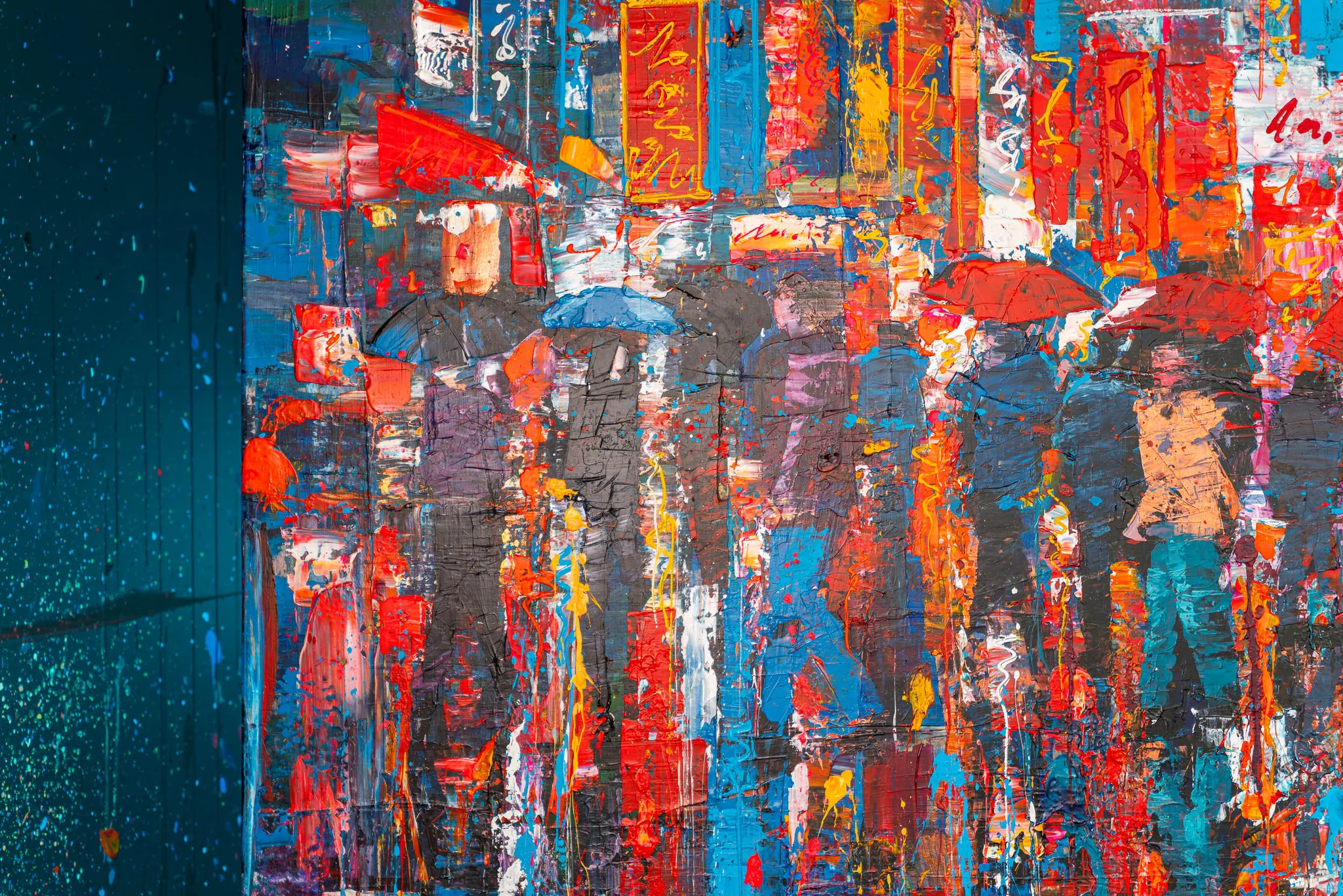 Close-up detail of Fairytale of New York, an original painting by Paul Kenton, showing rain-soaked pedestrians under red and blue umbrellas amid thick, dripping strokes of red, orange and blue.