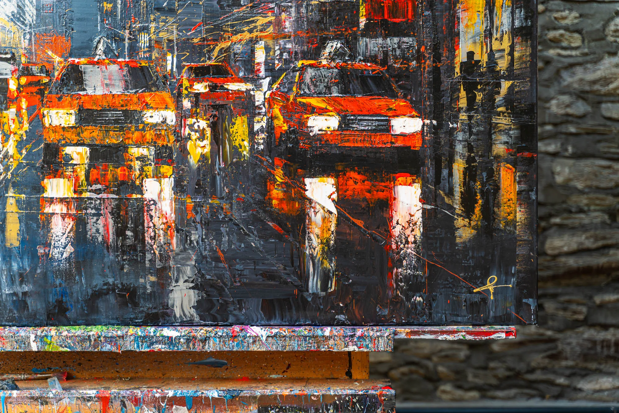 Close-up of Flight Of The Taxis, an original painting by Paul Kenton, showing thick textured red and orange taxis with glowing headlights in a dark, rain-streaked New York street.