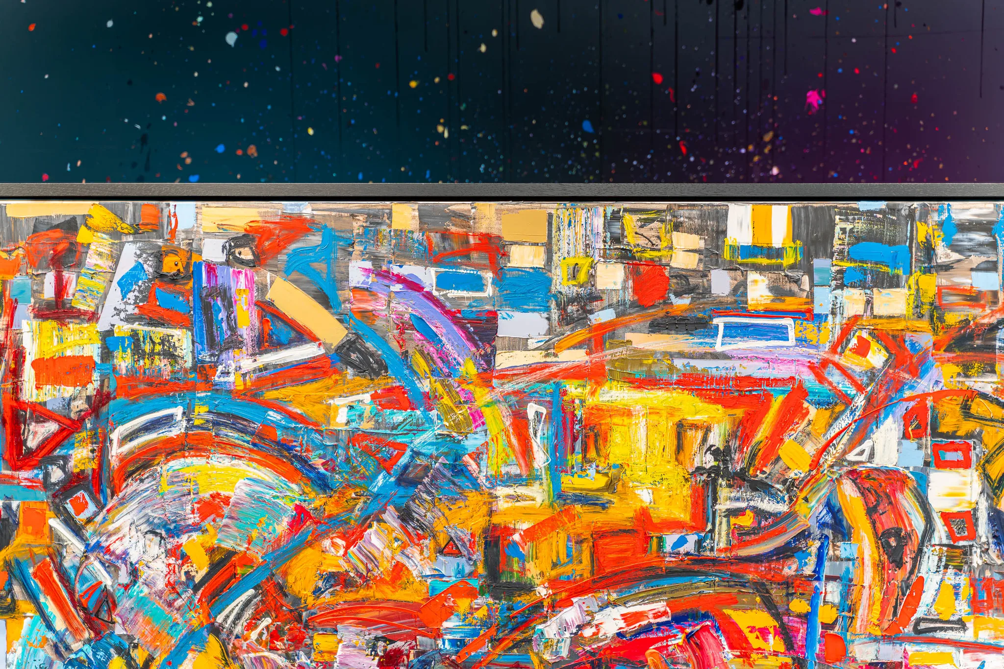 Close-up of Laid Back, an original mixed media painting by Paul Kenton, showing a dense, textured tangle of red, yellow and blue brushstrokes and flecks of metallic paint.