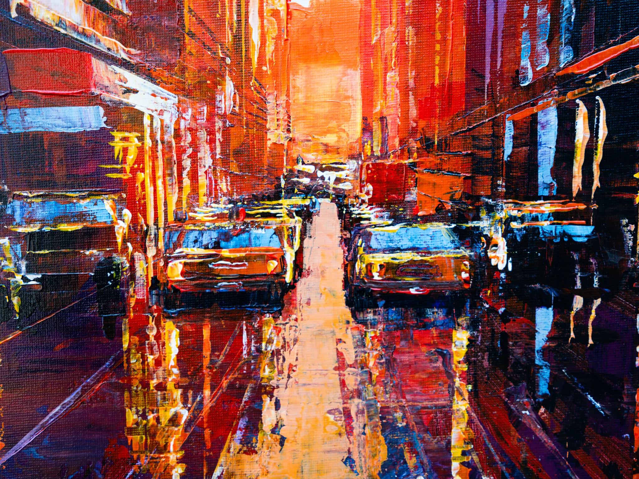 Close-up of Manhattan Heat, an original painting by Paul Kenton: thick, textured strokes of orange, red and gold show parked cars and reflections on a glowing city street.