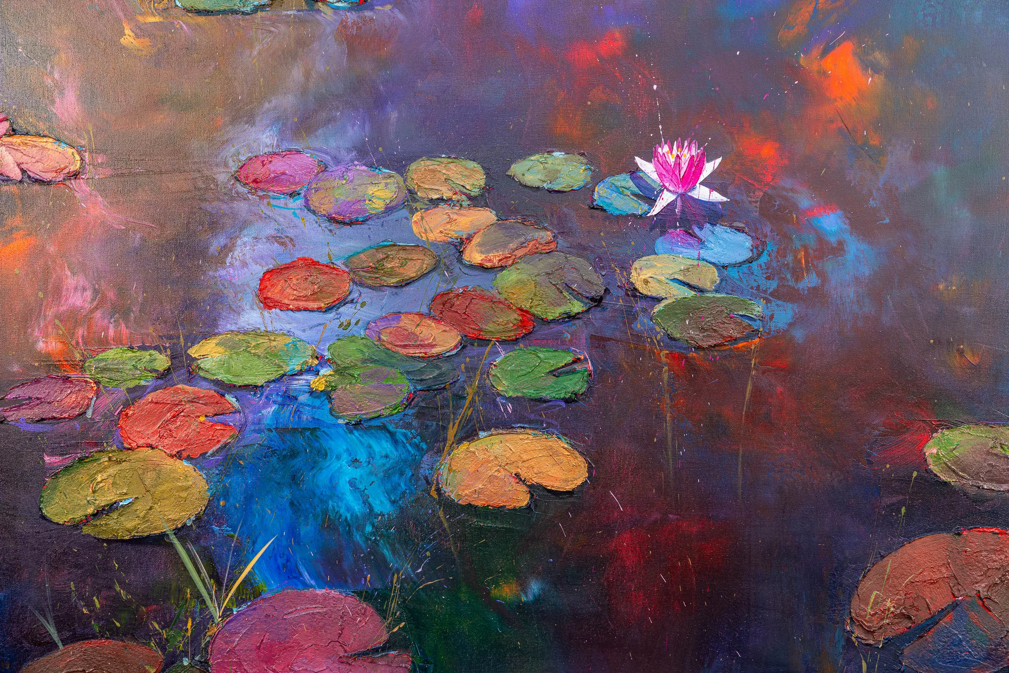 Close-up of Nocturne Blossoms, an original painting by Paul Kenton, showing thickly textured lily pads floating on a dark pond of blue, red and violet, with a single pink water lily in the upper right.