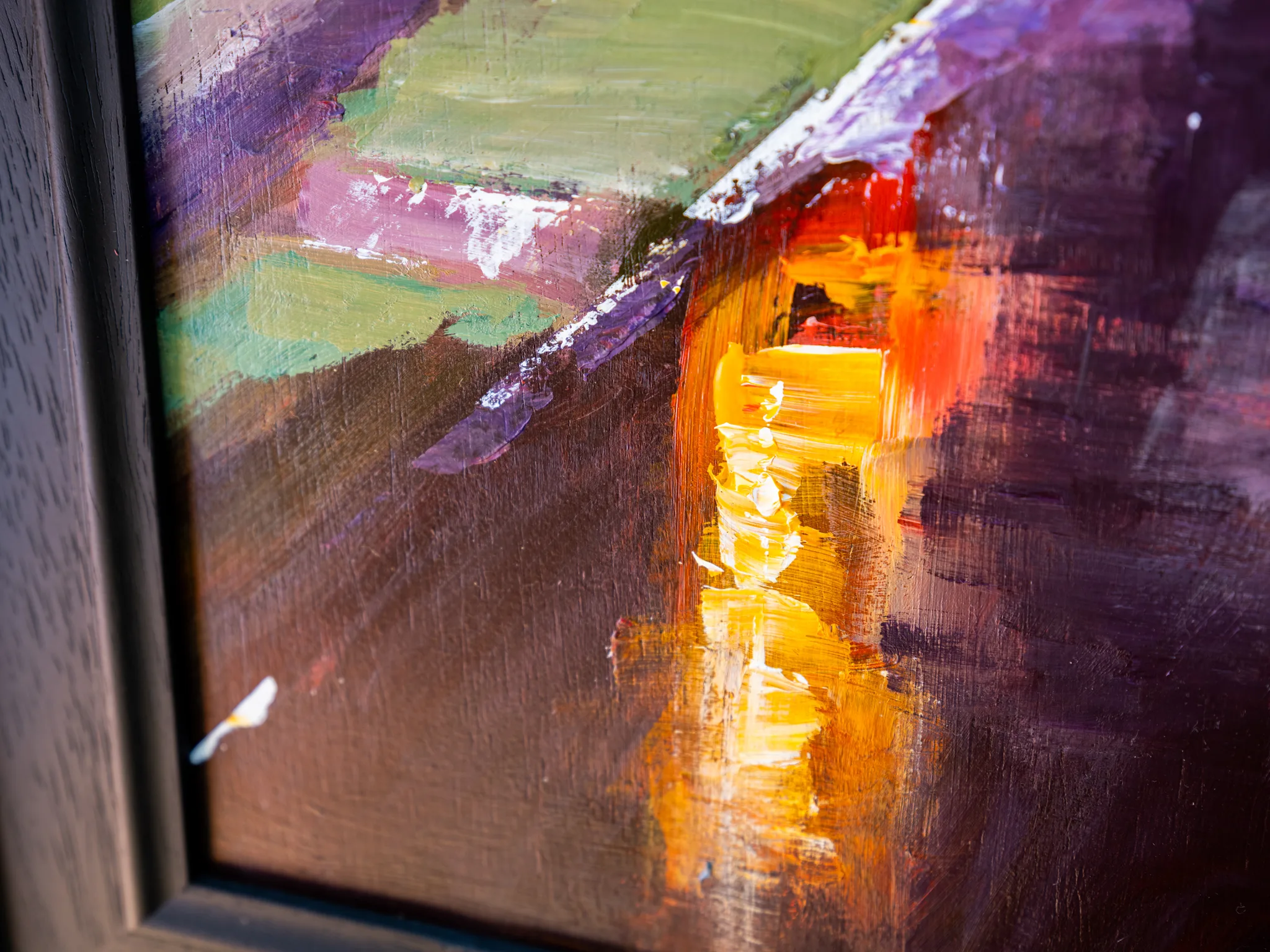 Close-up of Night Drive, an original painting by Paul Kenton, showing thick, textured brushstrokes of glowing yellow and orange light against deep purple and brown, with pale green and lilac edges at the top.