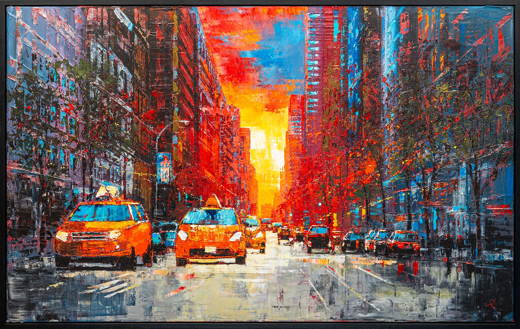 NY Ablaze, an original painting by Paul Kenton in a black floating frame: a rain-slicked New York avenue at sunset, with yellow taxis in the foreground and a fiery orange and red sky glowing between tall buildings.