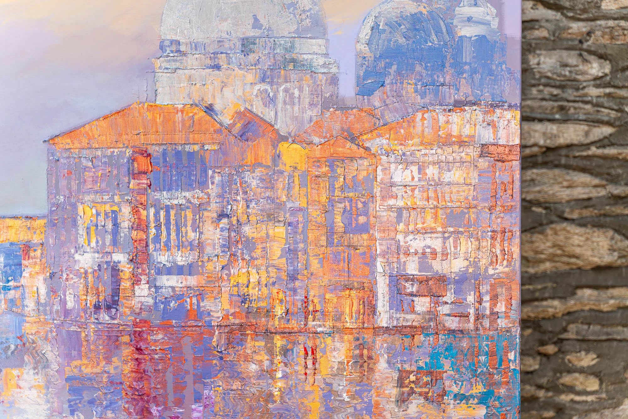 Close-up of Opalescent Venice, an original painting by Paul Kenton: thick, textured brushwork shows domes and palazzo facades in lilac, peach and gold, reflected in water below.