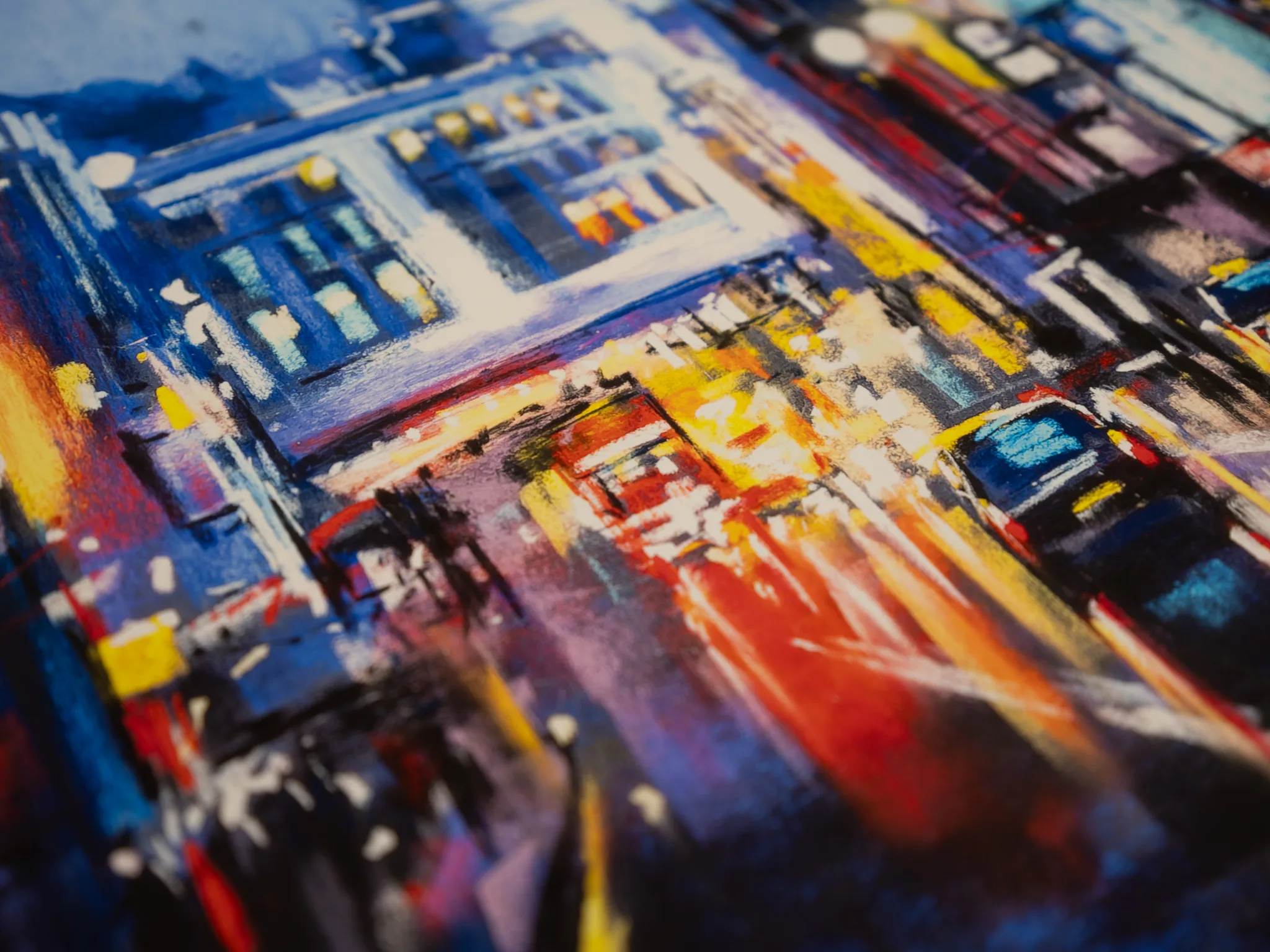 Close-up of the St Paul's Star limited edition giclée print, showing bold blue, red and yellow brushstrokes and glowing lights of a London street at night, with raised paint texture.
