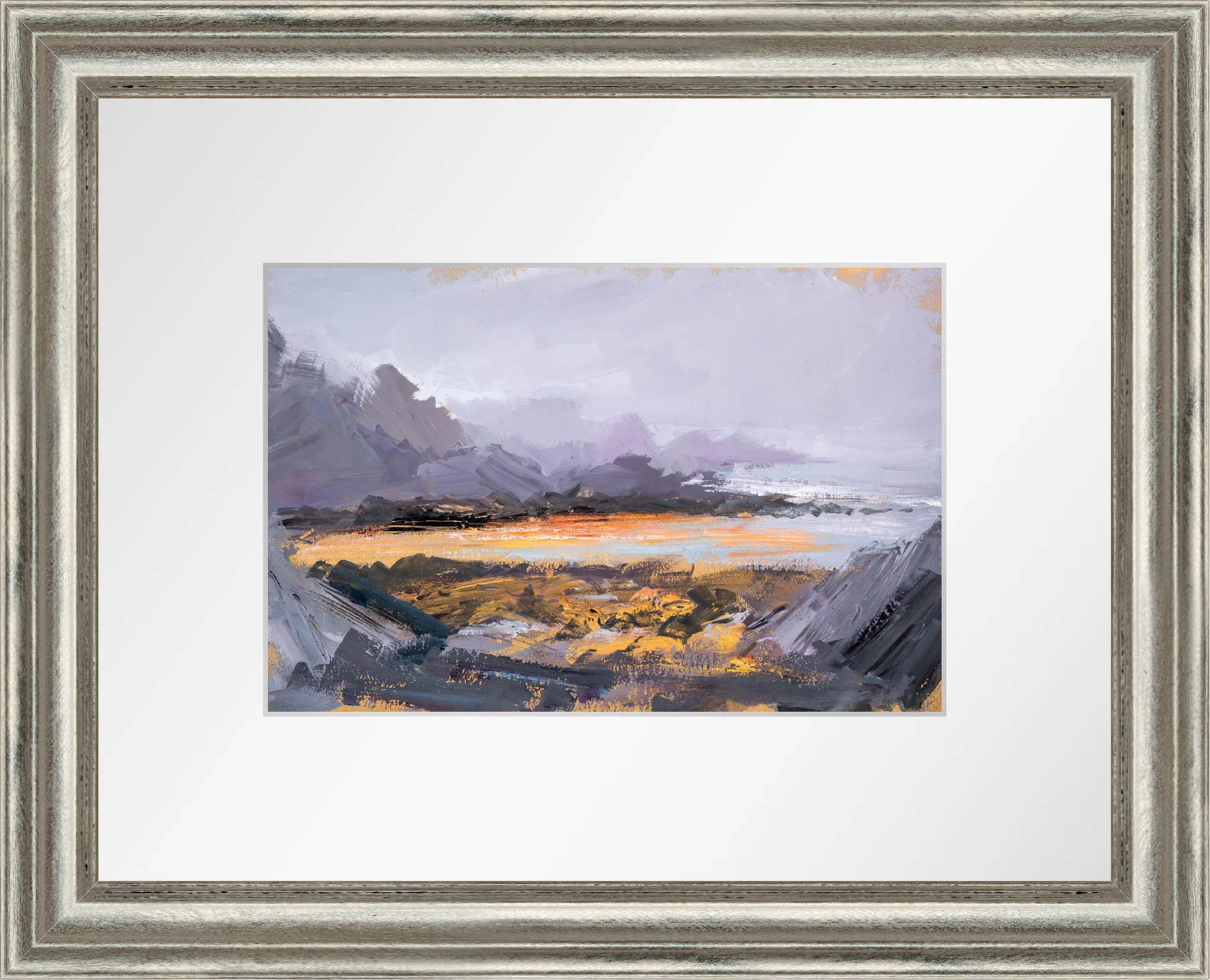 Misty Morning, a painting in a silver-grey ornate frame with a wide white mount. Loose brushstrokes show lilac-grey hills fading into haze above a glowing ochre and gold valley floor, with dark green-grey shadows at the edges.