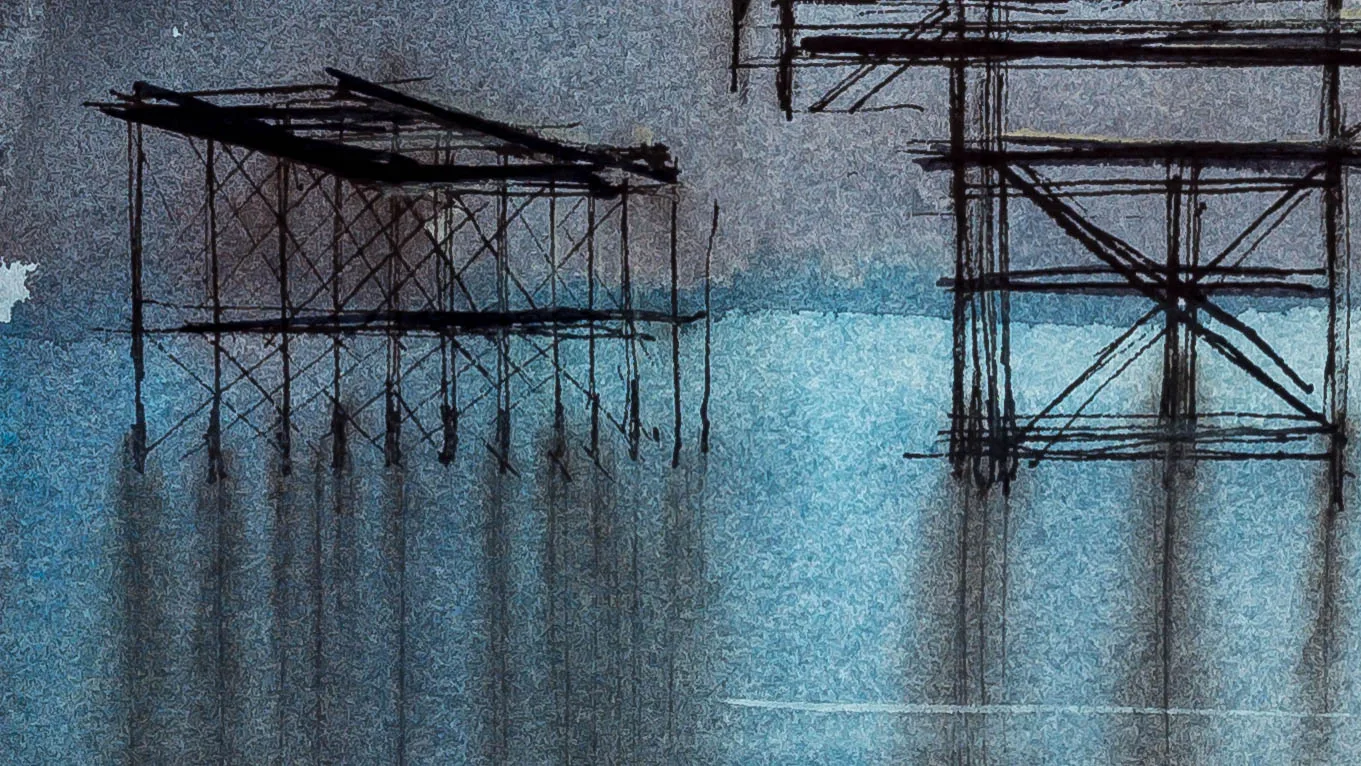 Close-up of Pier Remains: dark ink lattice frameworks of pier supports stand above blue-grey watercolour water, with soft reflections and textured wash marks.