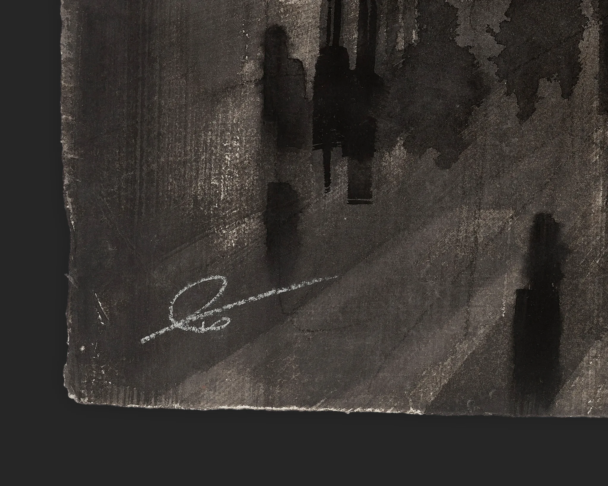Close-up detail of Times Square Bustle, an original ink and charcoal painting by Paul Kenton, showing his white chalk signature on dark, textured paper with shadowy city forms above.