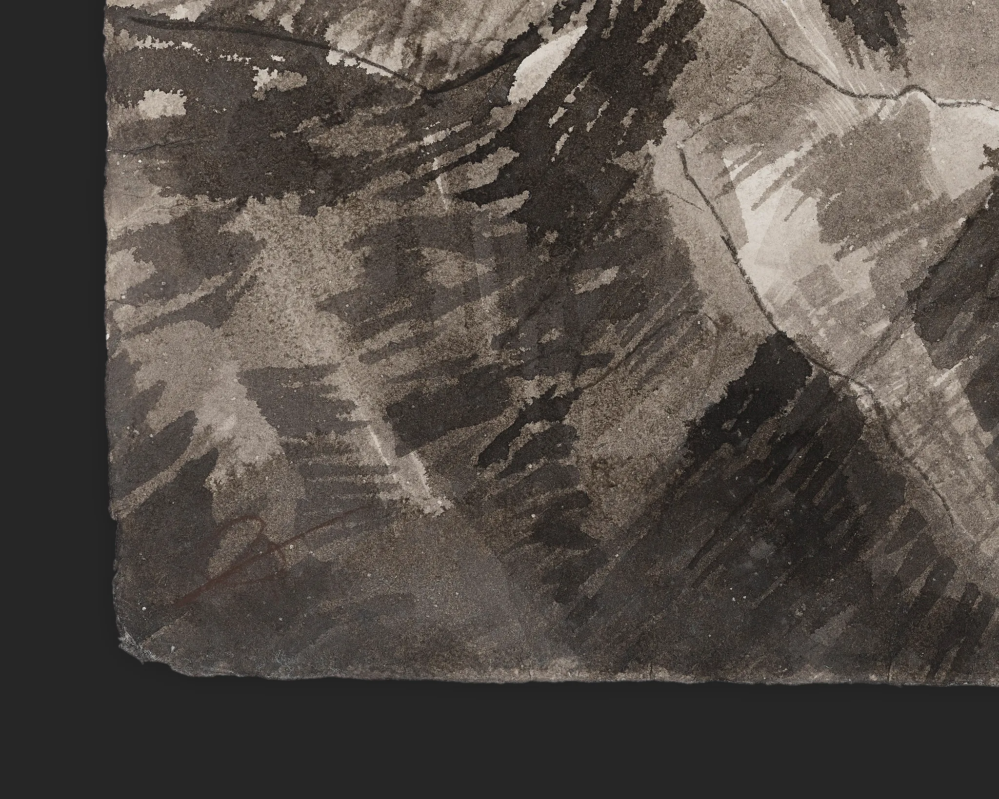Close-up detail of In the Stillness of Height, an original ink and charcoal painting by Paul Kenton, showing dark and pale grey strokes, textured paper and a soft, rough edge.