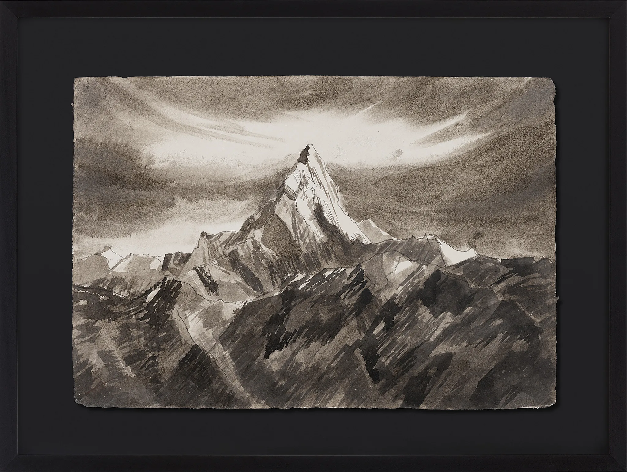 In the Stillness of Height, an original ink and charcoal painting by Paul Kenton in a black frame: a single sharp peak rises from dark, shadowed ridges beneath a pale, streaked sky.