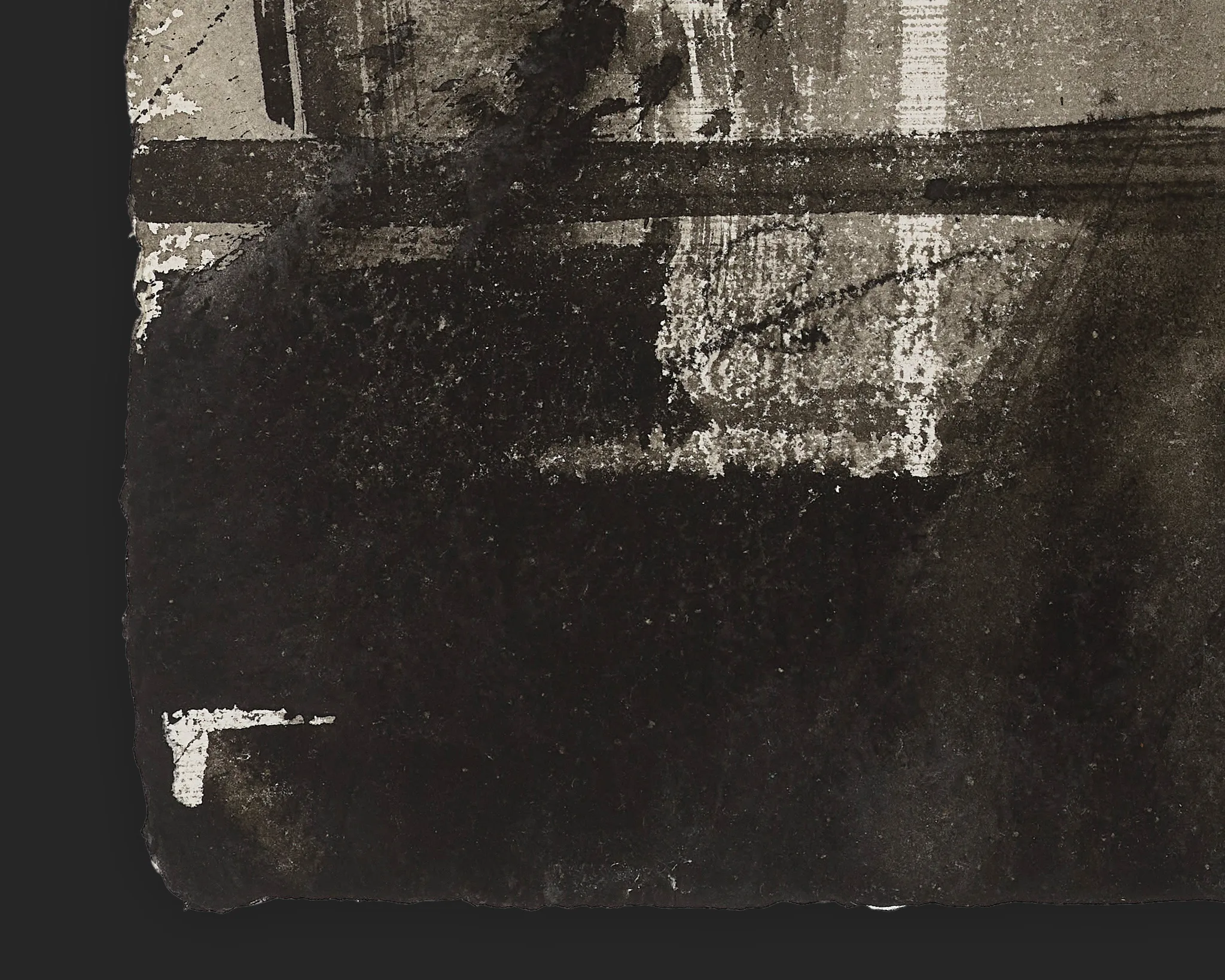 Close-up detail of Through the Archway, an original ink on Indian paper painting by Paul Kenton, showing dark smudged ink, grey washes and pale scraped marks in a textured, monochrome corner of the work.