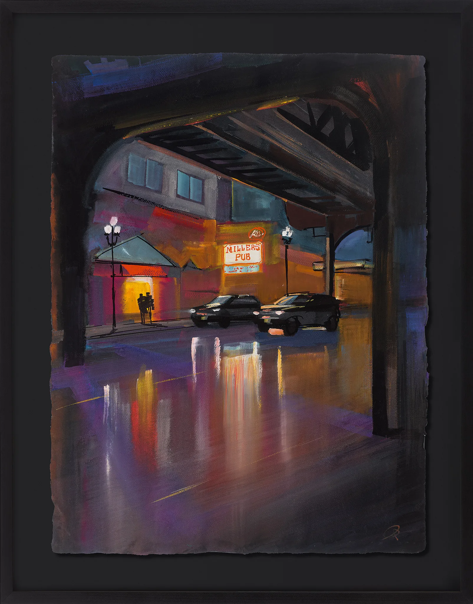 City Glow, an original gouache painting by Paul Kenton on black paper, shown in a black frame: a rainy night street beneath an elevated railway, with reflections of warm lights on wet tarmac.