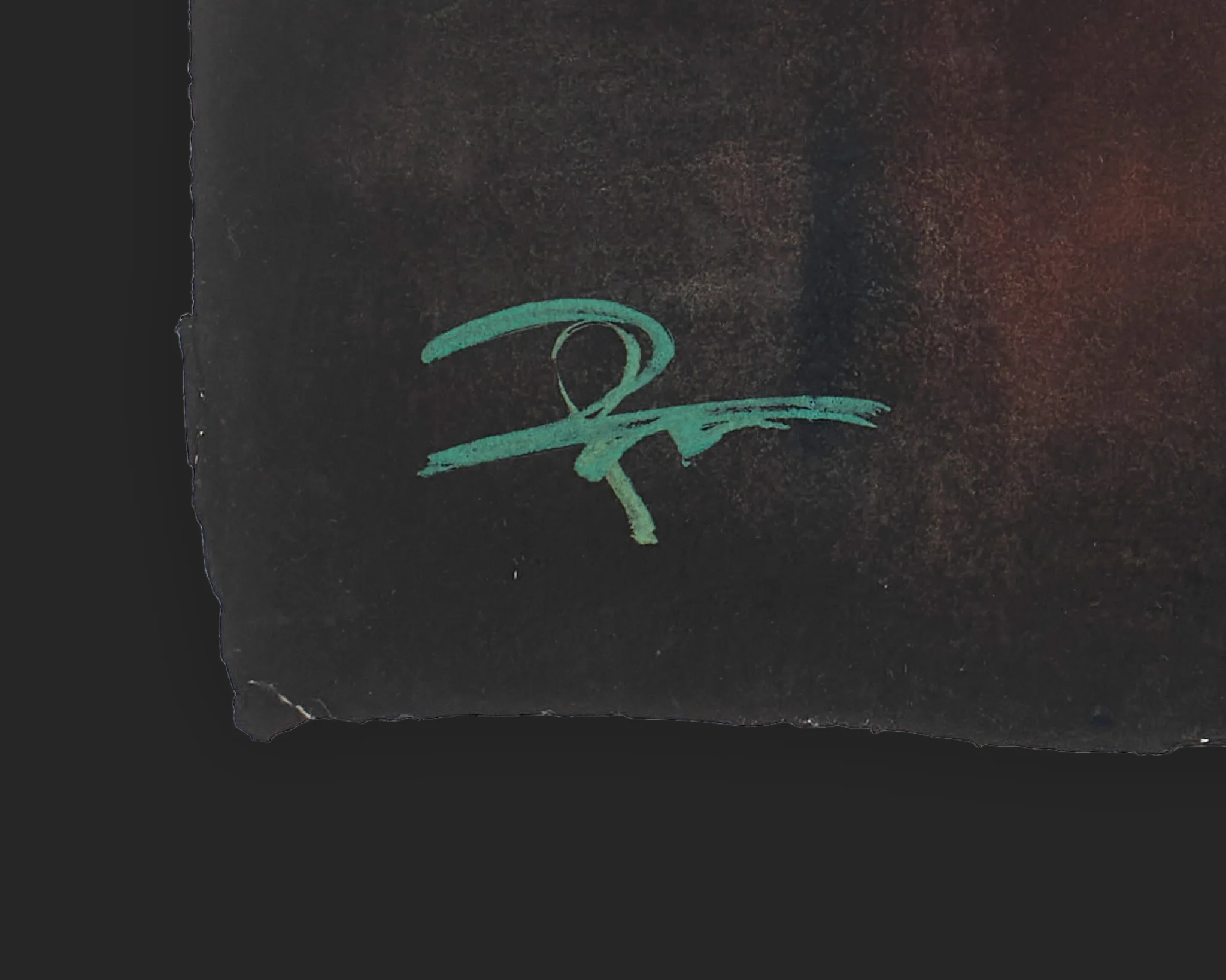 Close-up of the green painted signature of Paul Kenton on the deckled edge of Electric Haze, set against a dark, smudged background with hints of rust-red.