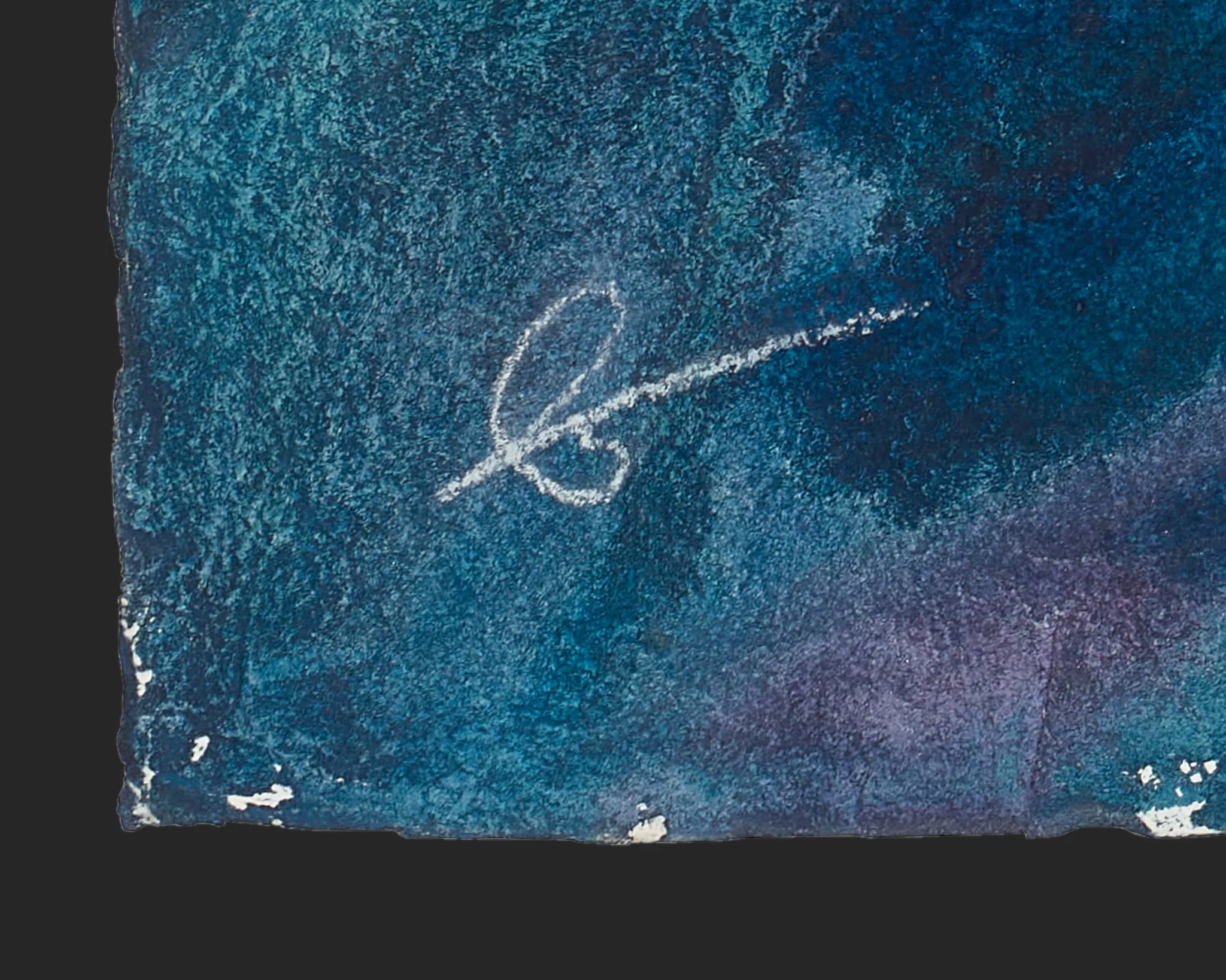 Close-up of the textured blue paint in Serene Currents, an original painting by Paul Kenton, showing his white chalk signature in the lower left.