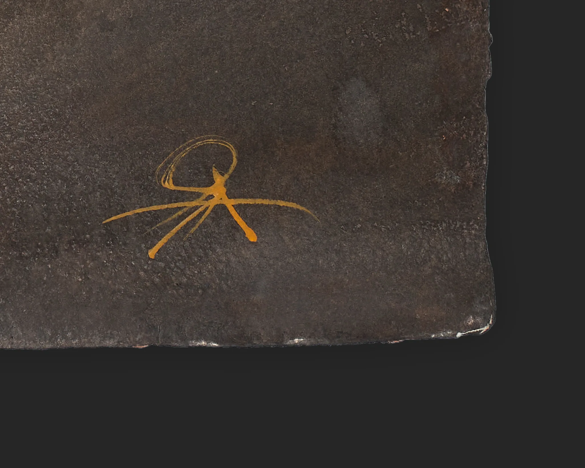 Close-up of the lower corner of Inviting Warmth, an original painting by Paul Kenton, showing his gold signature with sweeping strokes on dark, textured paper.