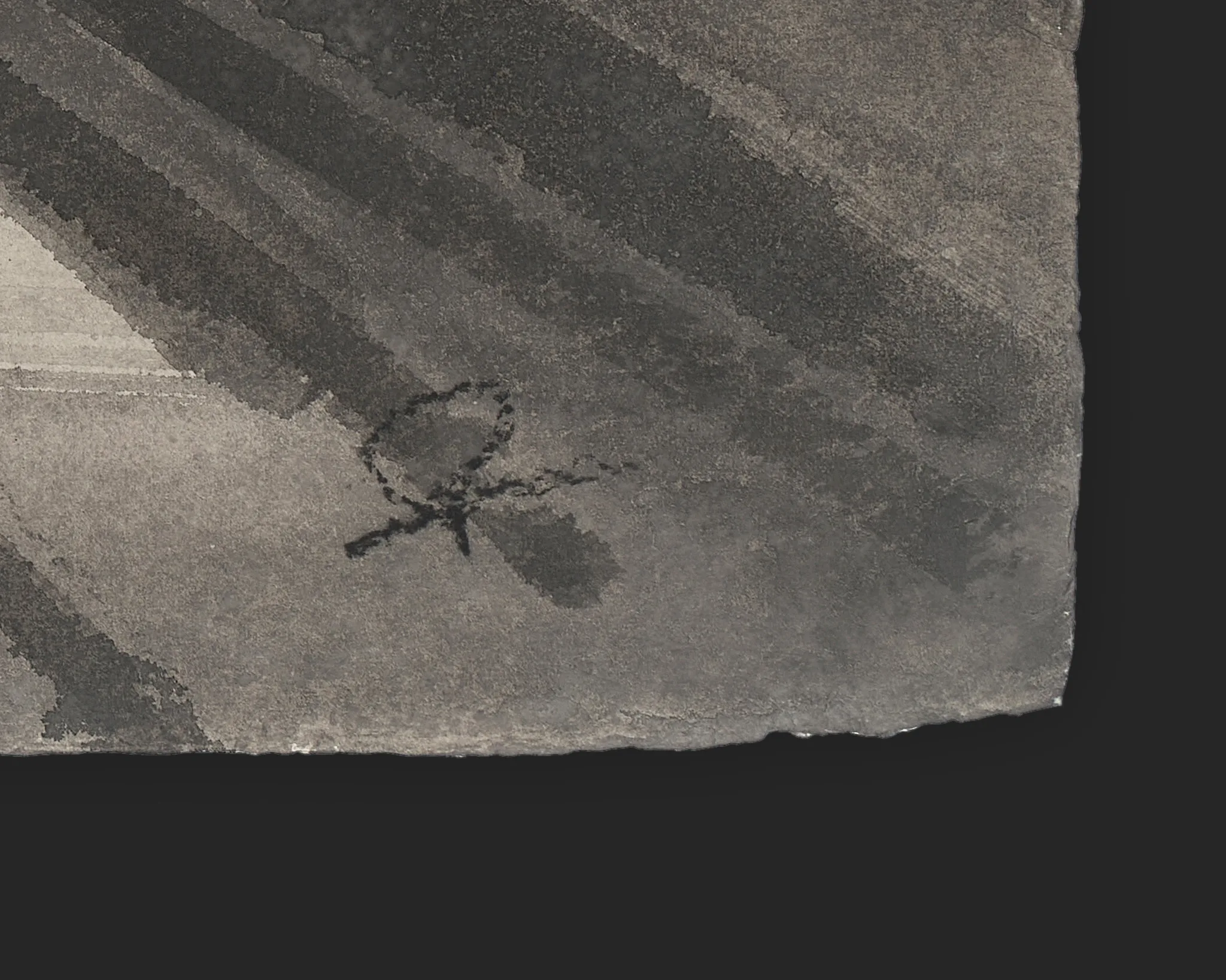 Close-up detail of Chasing the Day, an original ink on Indian paper painting by Paul Kenton: his dark signature sits in the lower corner beside grey diagonal bands of wash and a pale patch at the left edge.