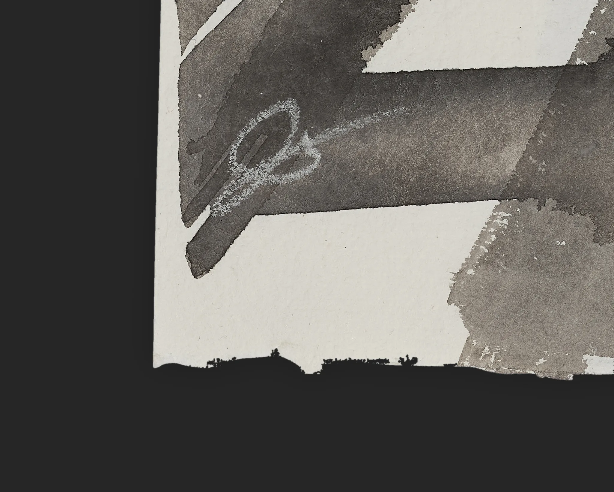 Close-up detail of Vanishing Lines, an original ink on Indian paper painting by Paul Kenton, showing his pencilled signature over grey wash shapes and the torn, deckled paper edge.