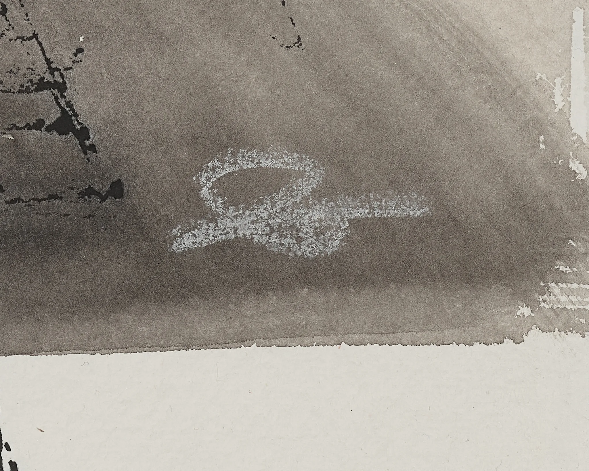 Close-up detail of Facade In Light, an original ink painting by Paul Kenton, showing his pale embossed signature on a grey-brown wash above a cream paper edge.