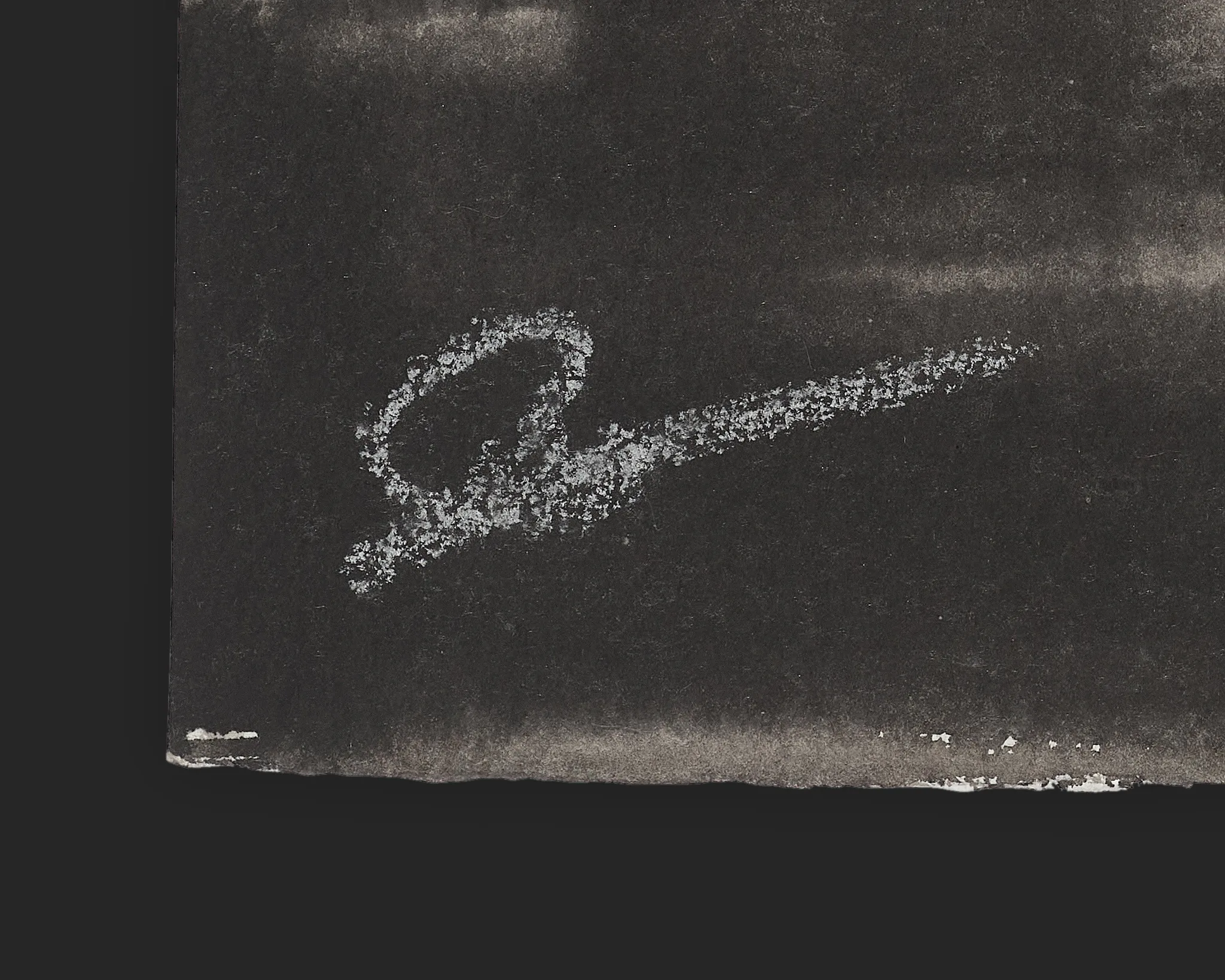 Close-up detail of Silent Harbour, an original ink painting by Paul Kenton, showing his pale grey signature in chalky strokes on dark, mottled paper.