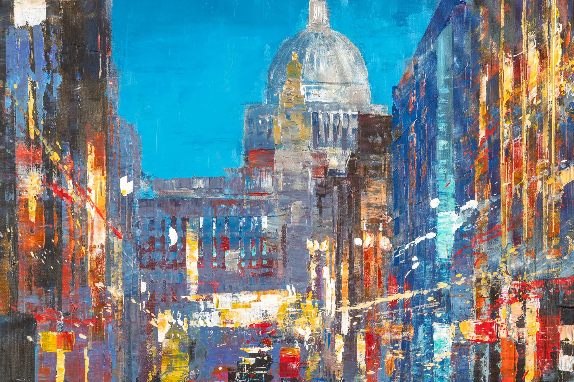 Close-up of Cathedral of Light, a limited edition print by Paul Kenton, showing a textured London street at dusk with a domed cathedral against bright blue sky, lit by warm yellow and red glows.