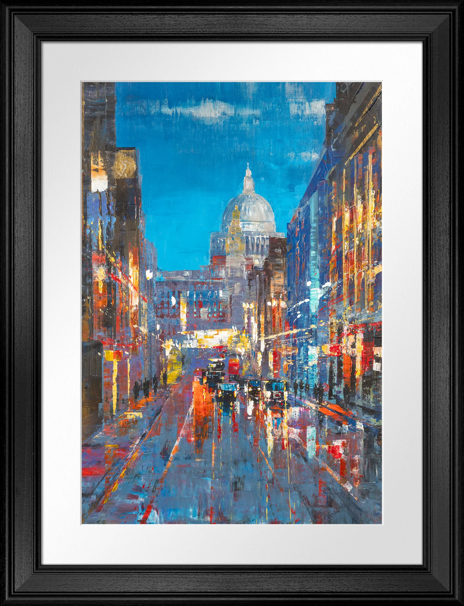 Cathedral of Light, a limited edition print by Paul Kenton in a black frame with white mount: a dusk street in London, with the dome of St Paul's Cathedral under a blue sky, warm lit windows and reflections on wet road.
