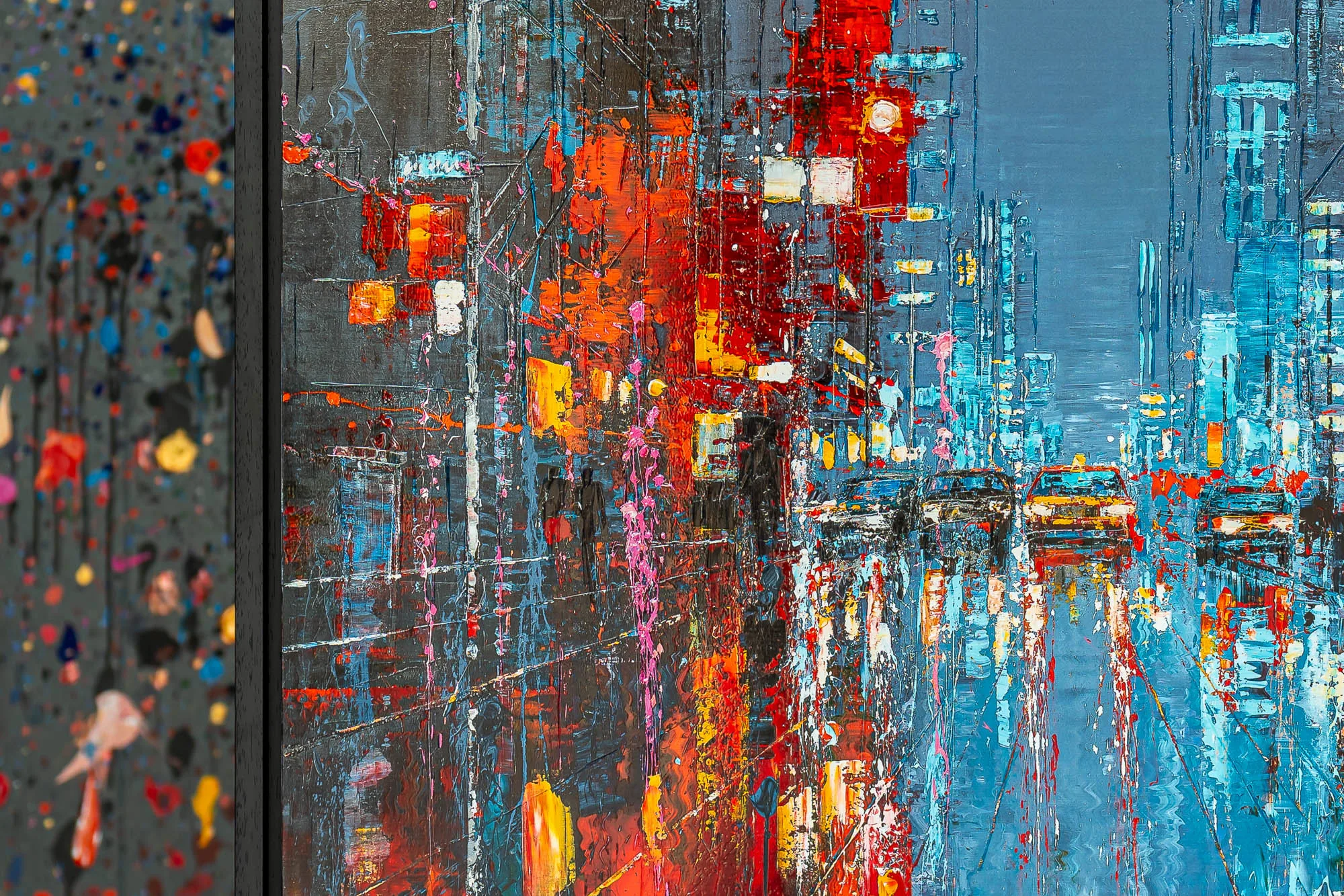 Close-up of Electric Crossroads, a limited edition print by Paul Kenton: thick, textured streaks of red, orange and yellow lights blur into cool blue taxis and skyscrapers, with paint drips and speckles at the left edge.