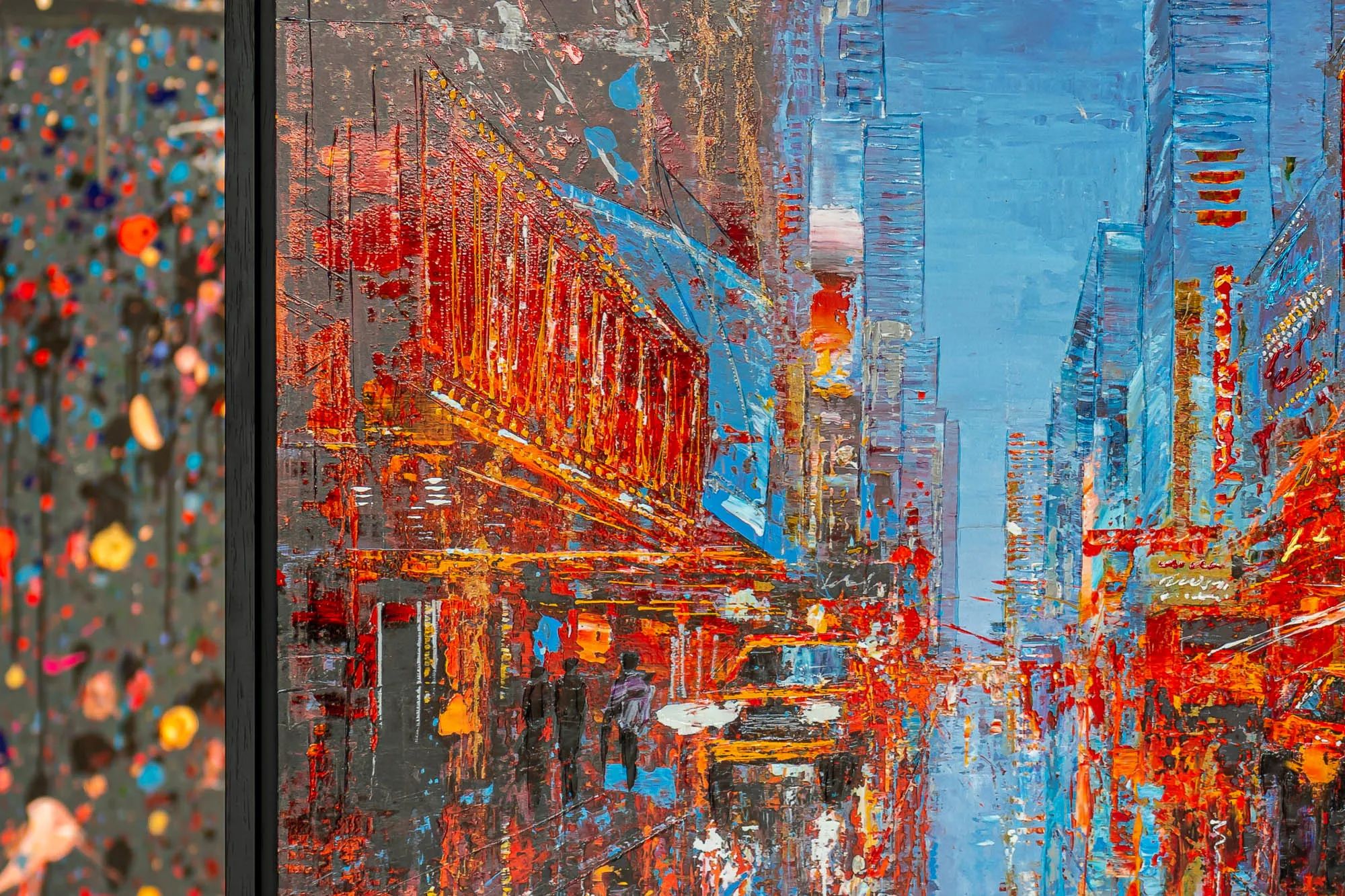 Close-up of Empire City Spectrum, a New York street scene with thickly textured red and orange light streaking down a grey-brown avenue, towering blue skyscrapers on the right, and small figures near the glowing storefronts.