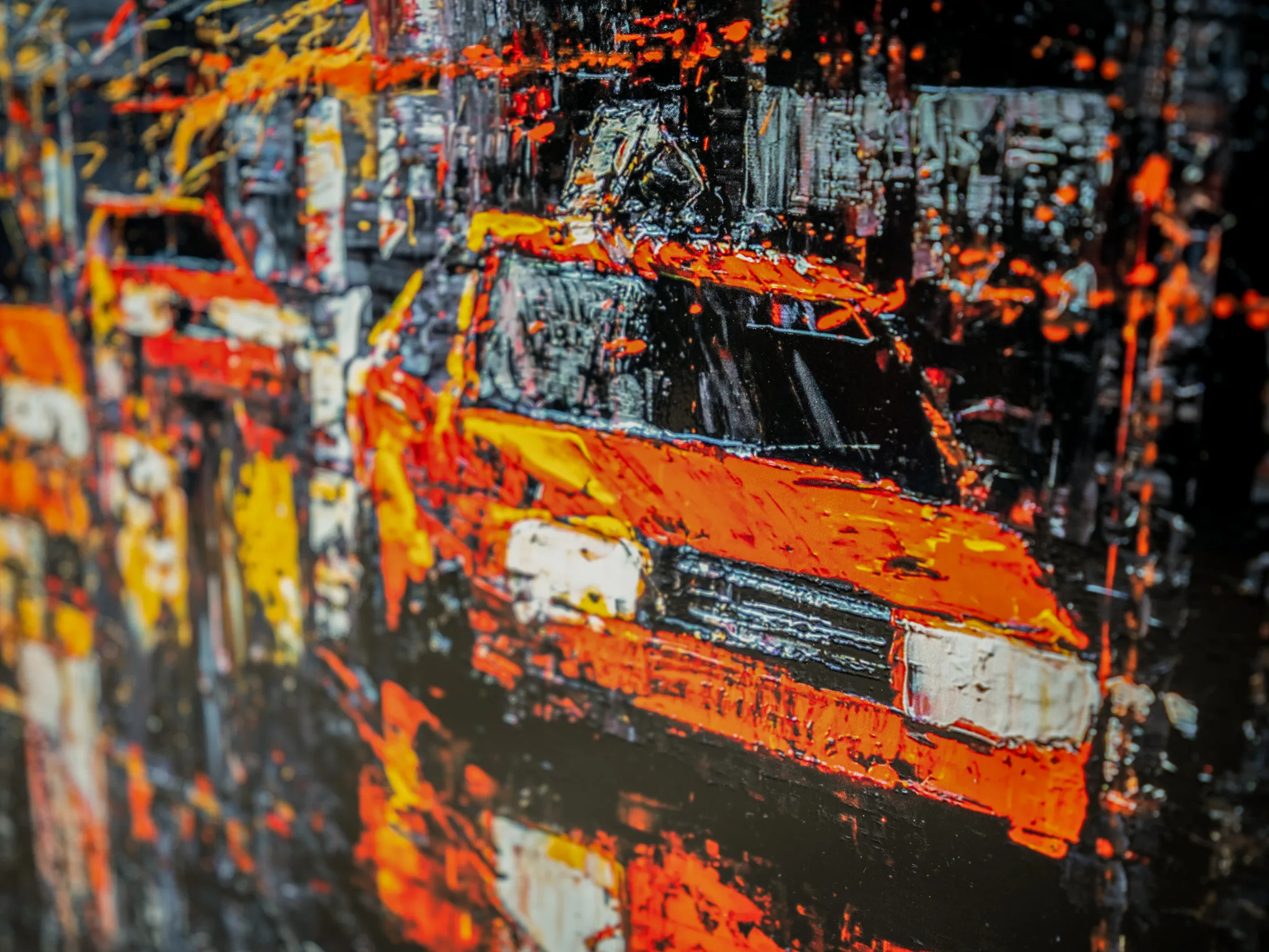 Close-up of Flight of the Taxis, a limited edition print by Paul Kenton, showing thick orange and yellow impasto strokes forming a yellow taxi's front and headlights against dark, textured city shapes.